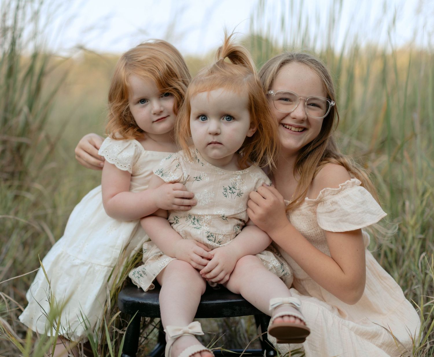 Sisters photos in tall grasses