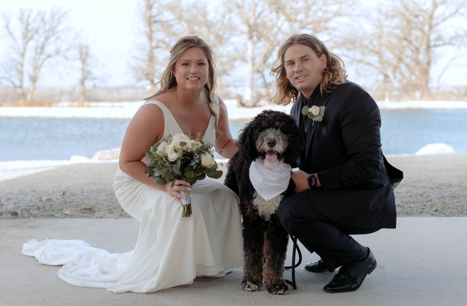 bride and groom portrait with their dog