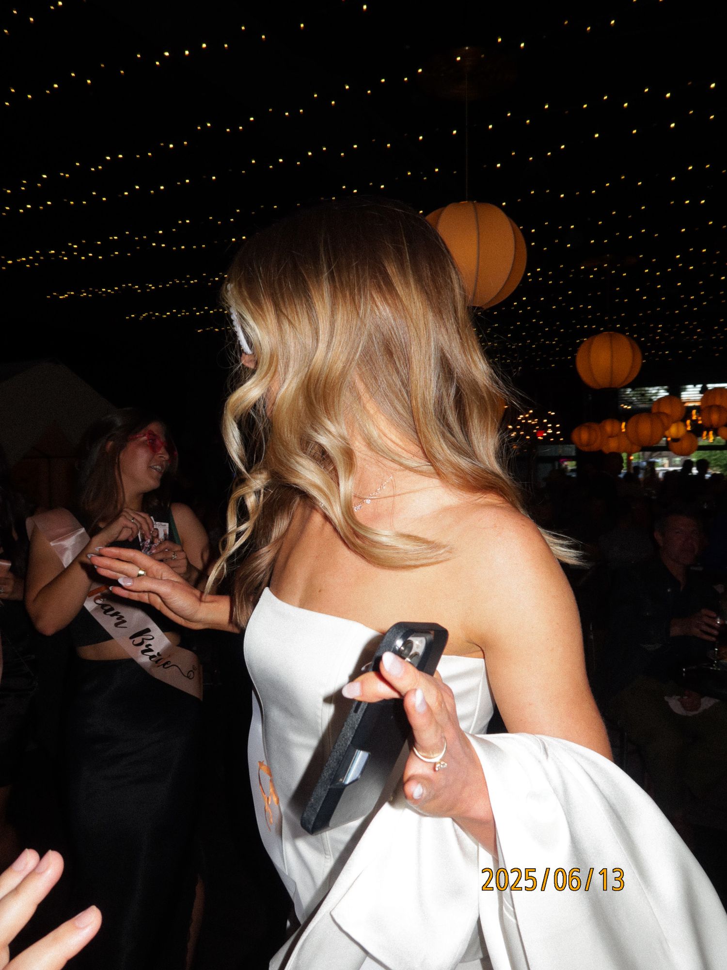 A sequence of photos showing partygoers dancing and socializing at a nighttime event with orange lighting effects.