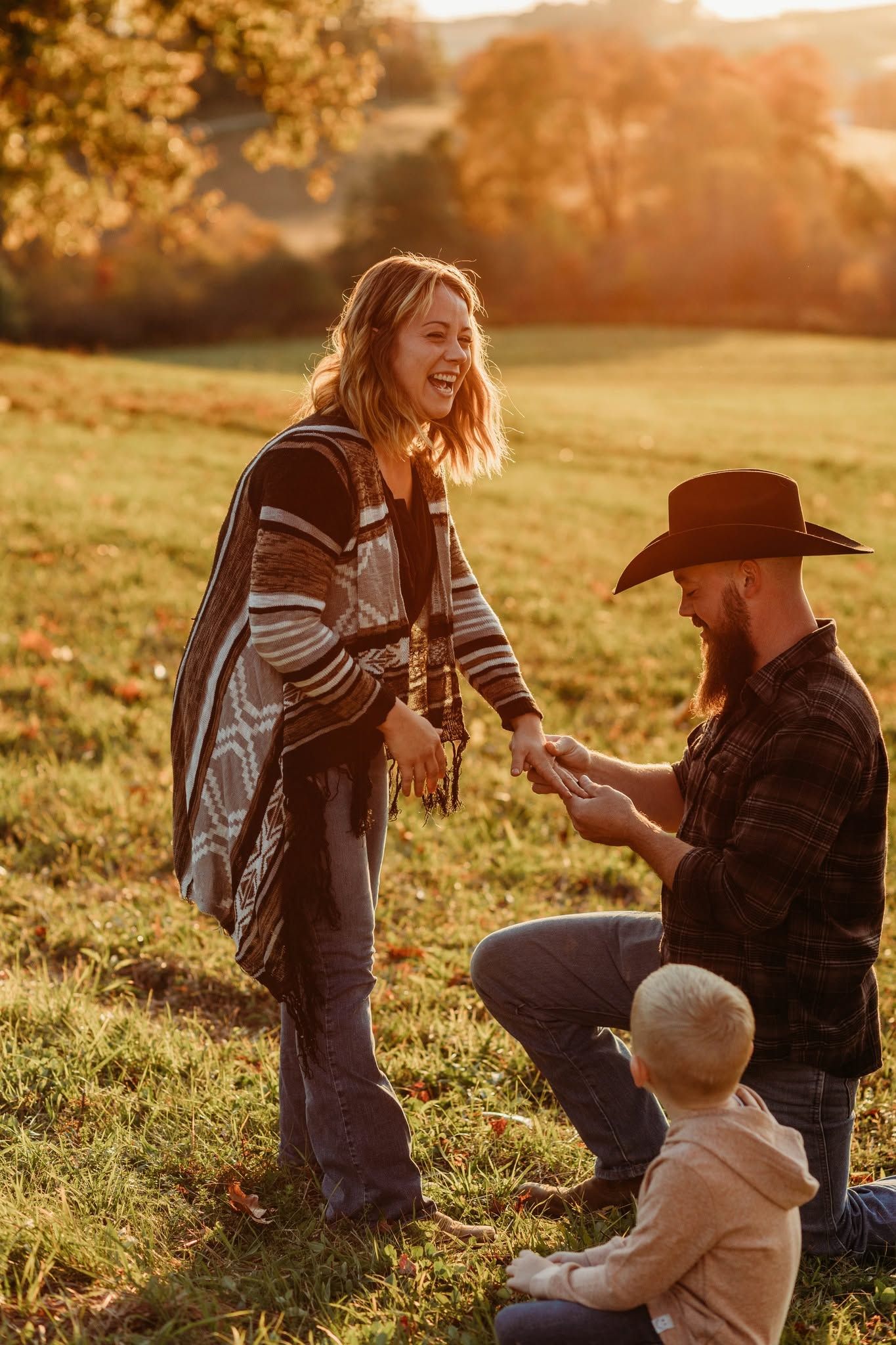 Sunset proposal scene captured in sequence on a grassy hillside.