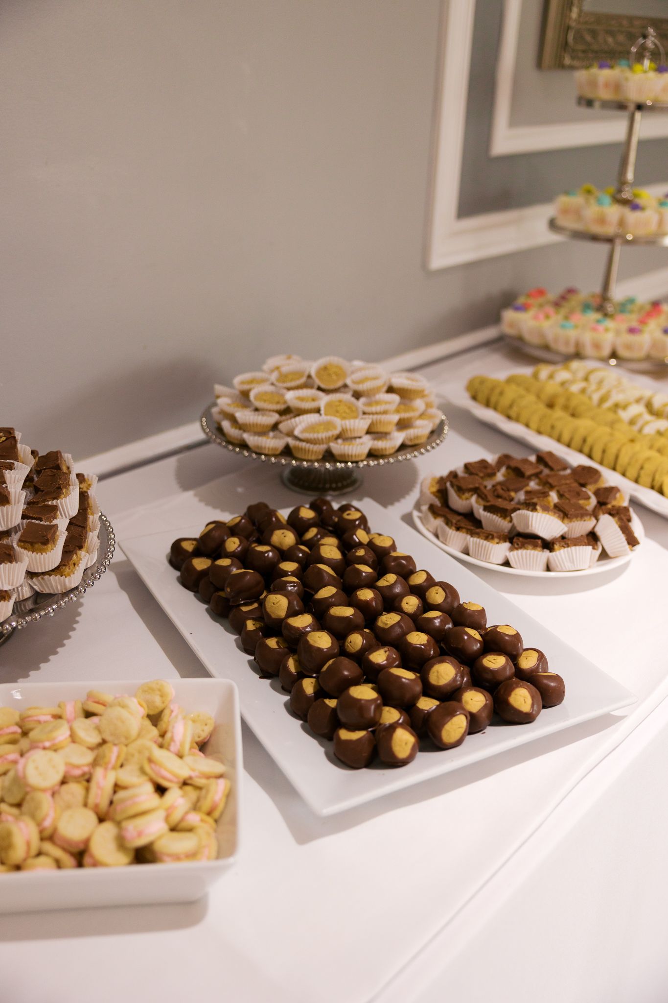 buckeye cookies on a white rectangle tray