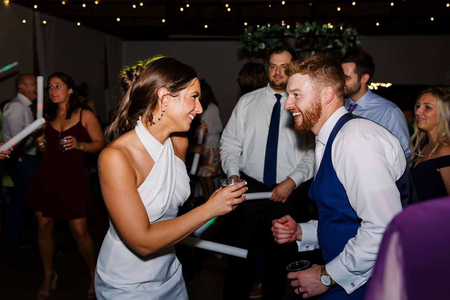 Couple dancing at fun reception at Monarch Veil