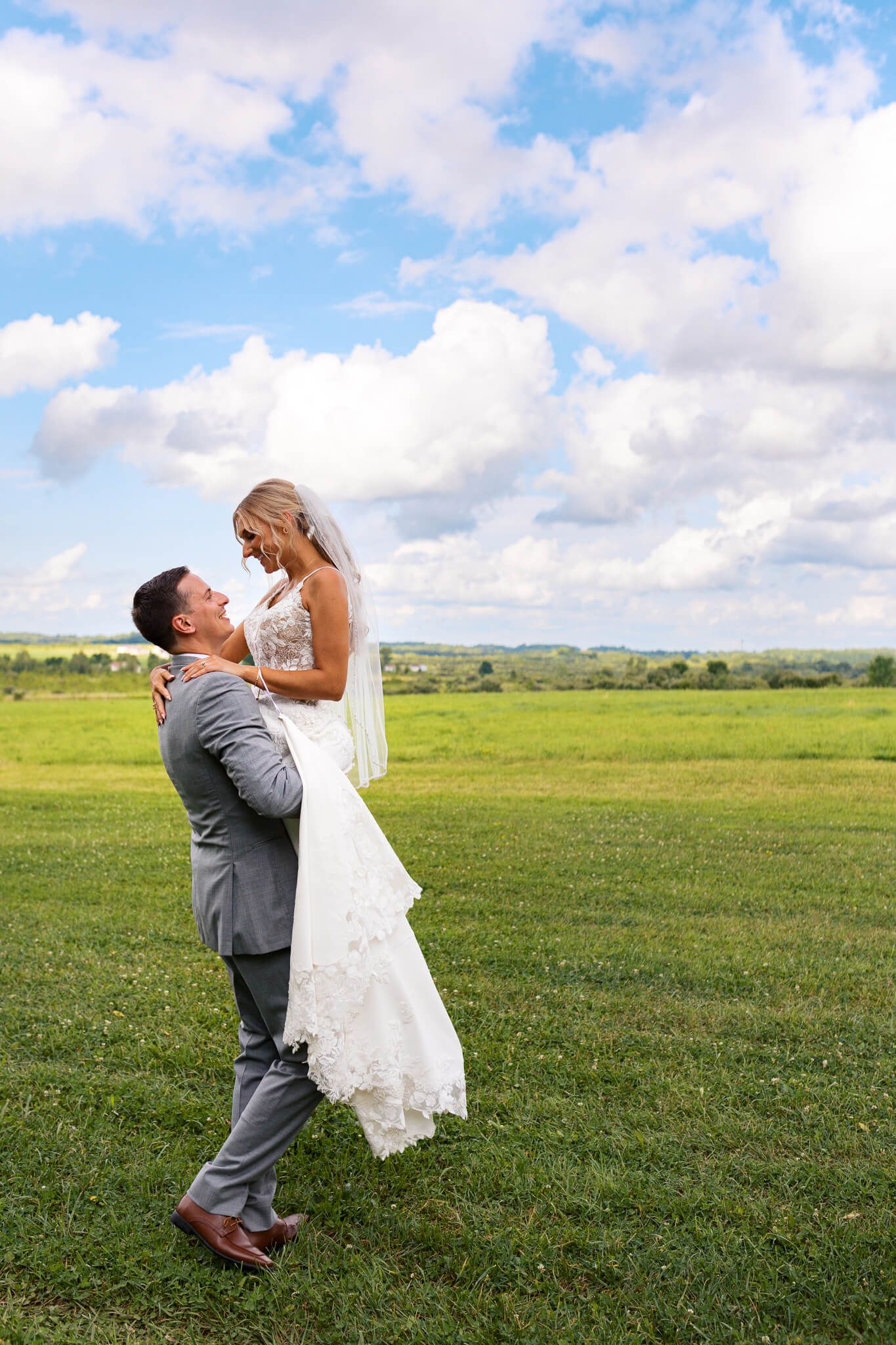 Groom holds bride romantically at Willowbrook Wedding Venue in Western Pennsylvania
