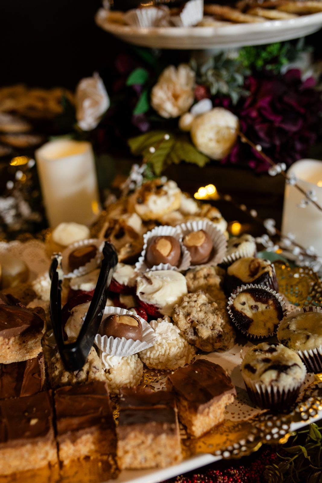 buckeye cookies and oreo cookie brownie bites mixed with a variety of traditional pittsburgh wedding cookies