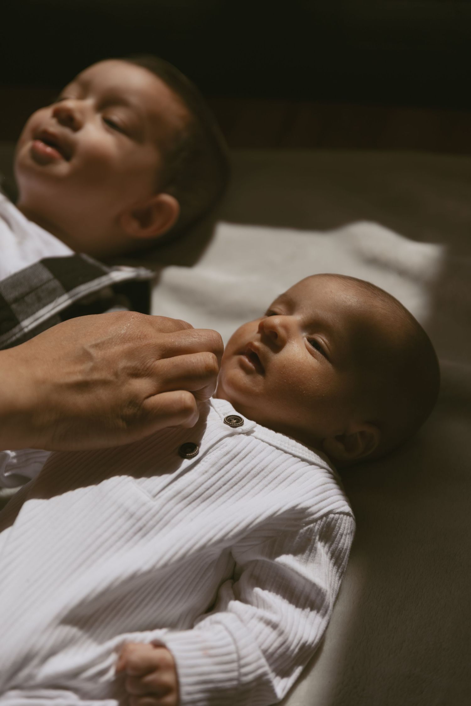 Family indoor photoshoot using natural window light at a coffee shop in Sussex County New Jersey