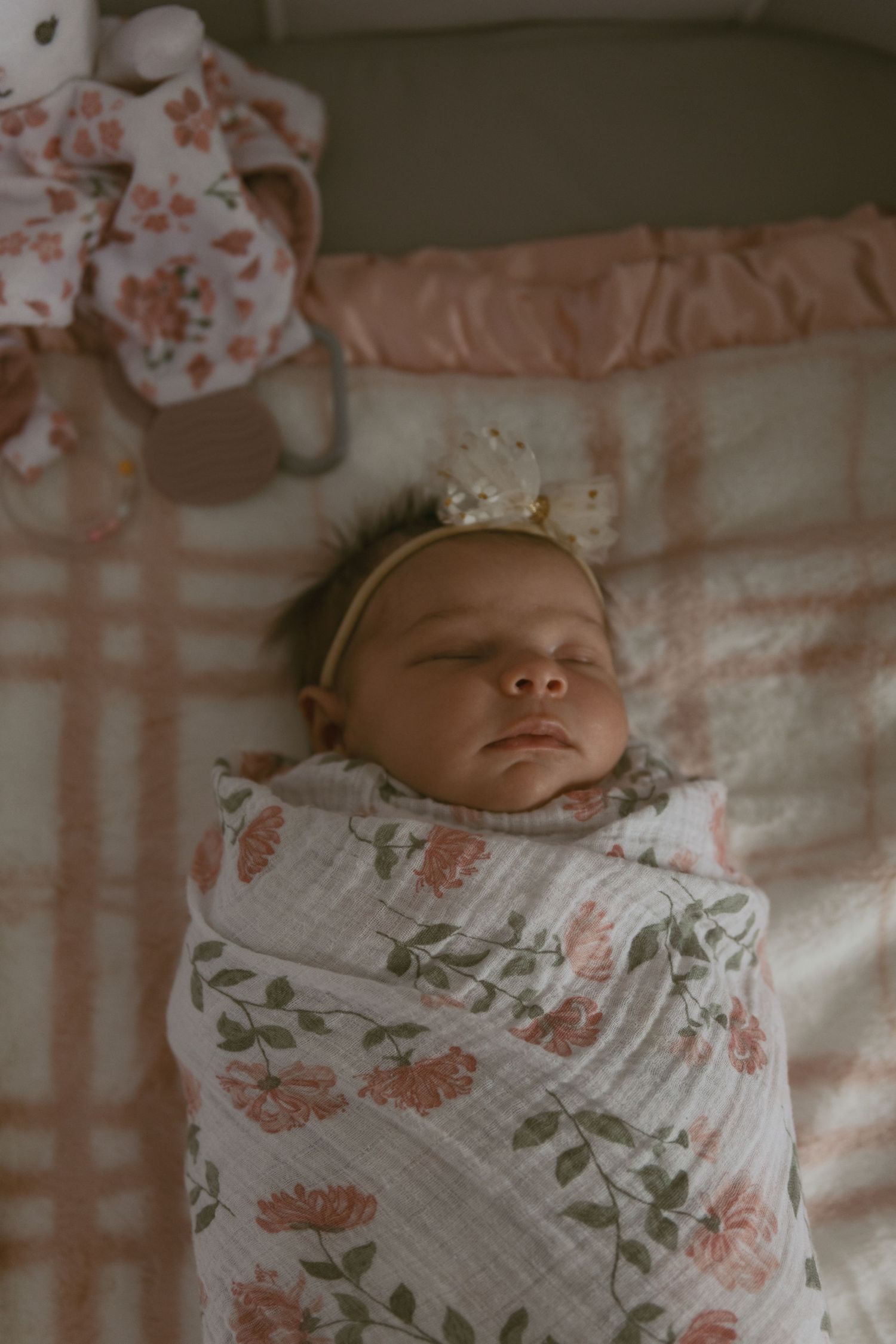 Newborn baby on bed in Sussex County New Jersey during an at-home photoshoot