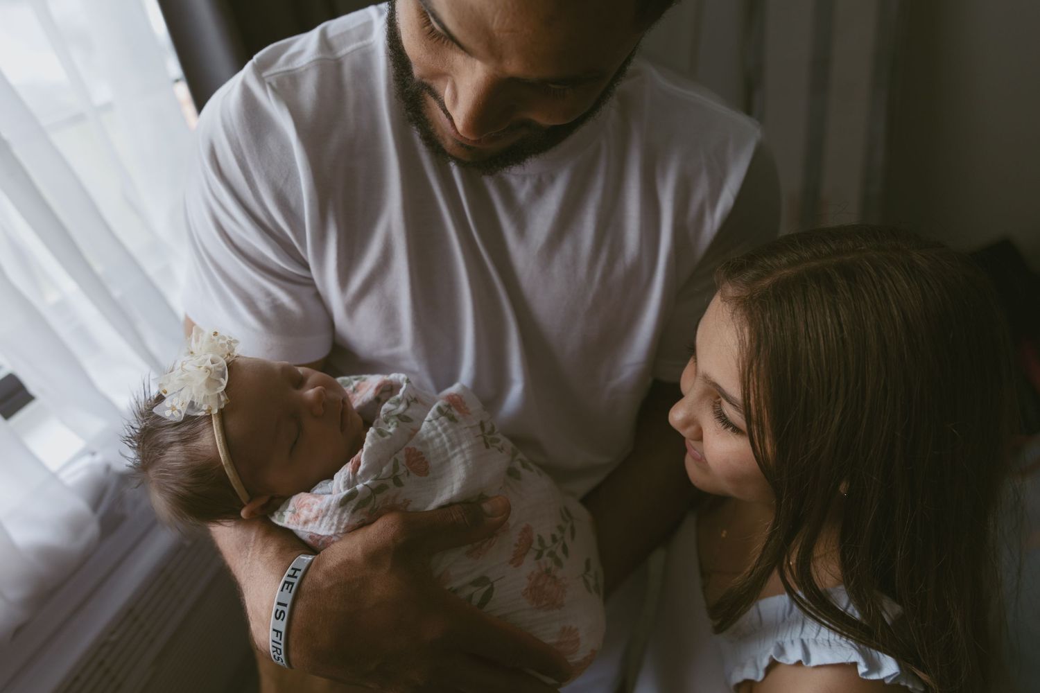 Indoor newborn family photoshoot using natural window light in Sussex County New Jersey