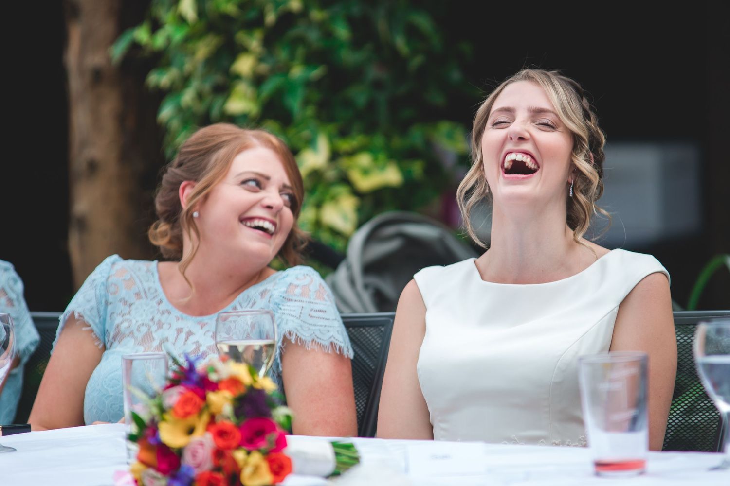 Candid Moments between Bride & Bridesmaid at the wedding breakfast.
