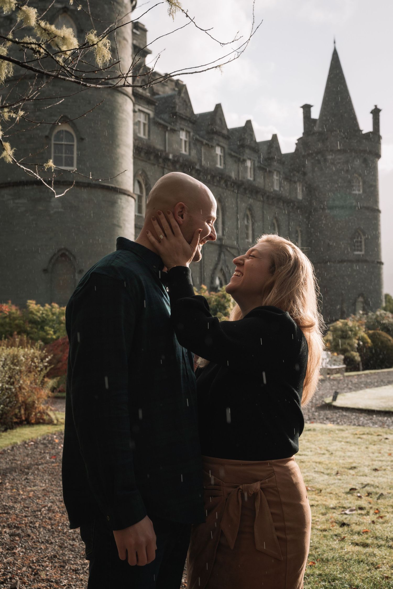 Candid moment during engagement session at Inveraray Castle