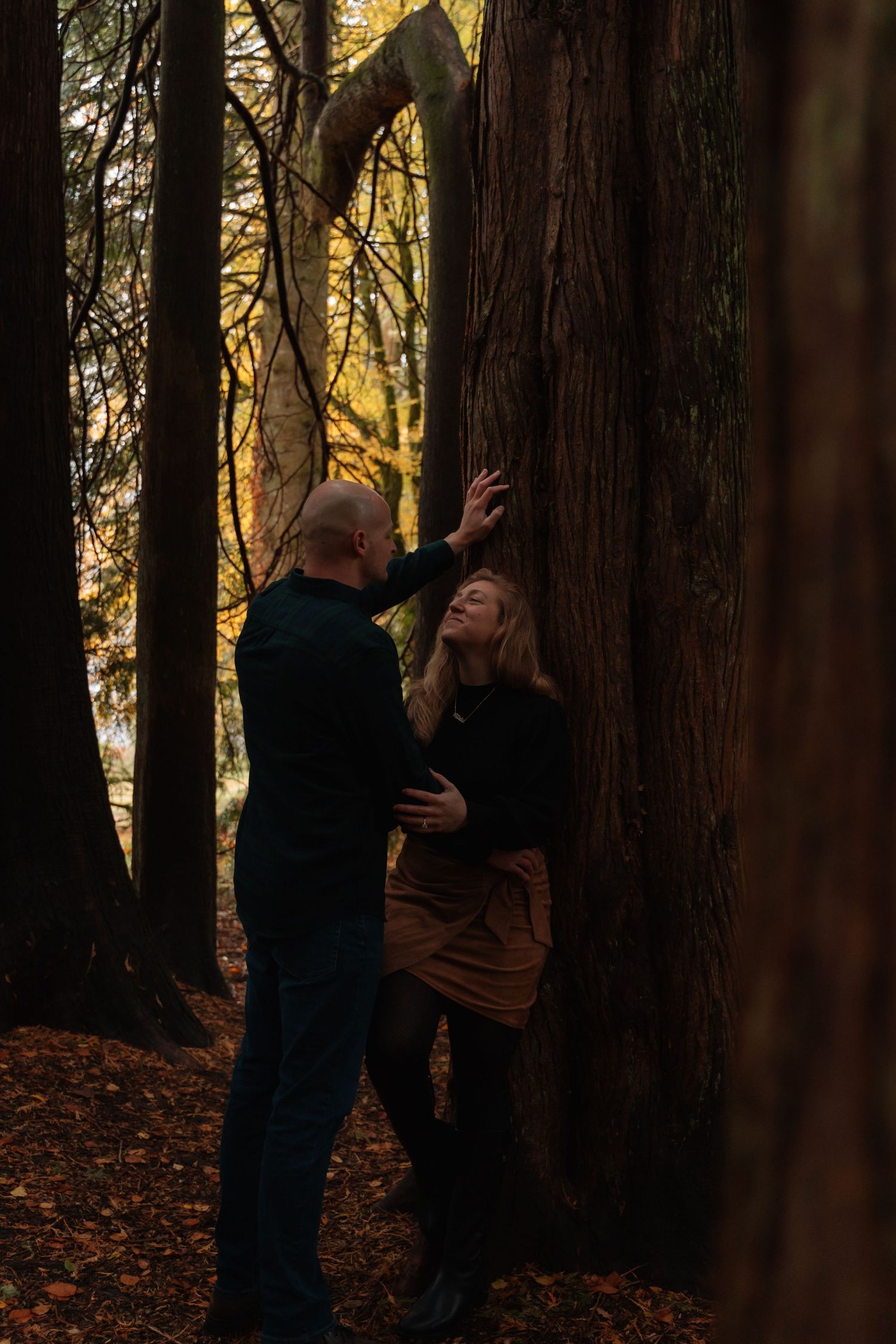 Couple embracing in castle gardens
