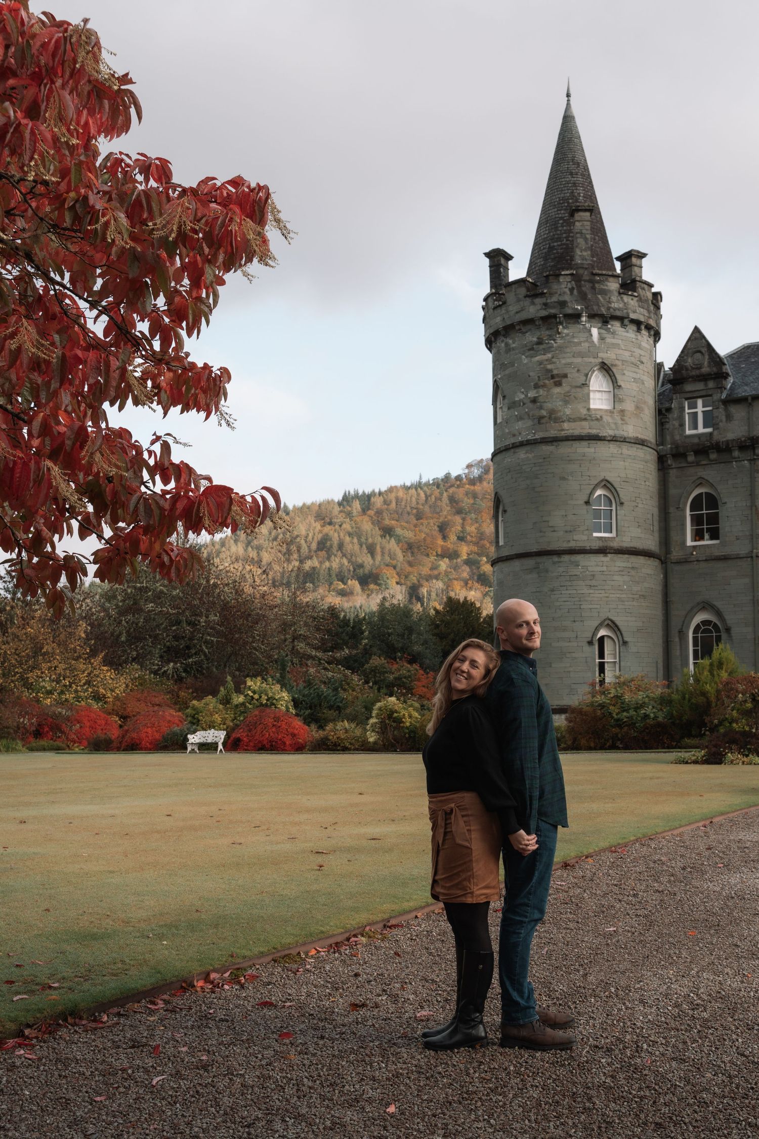 Candid moment during engagement session at Inveraray Castle