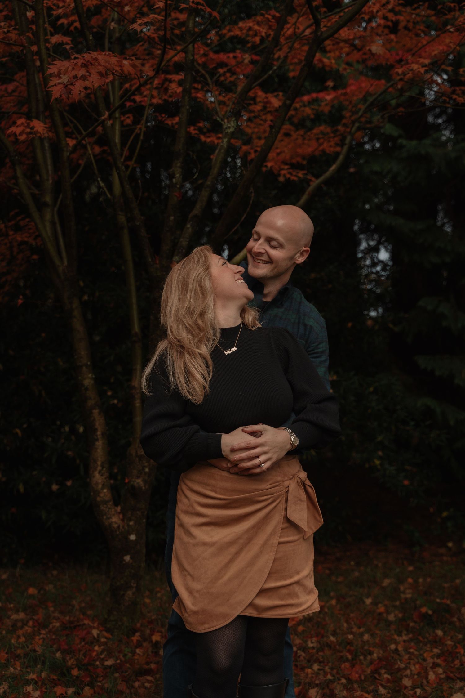 Candid moment during engagement session at Inveraray Castle