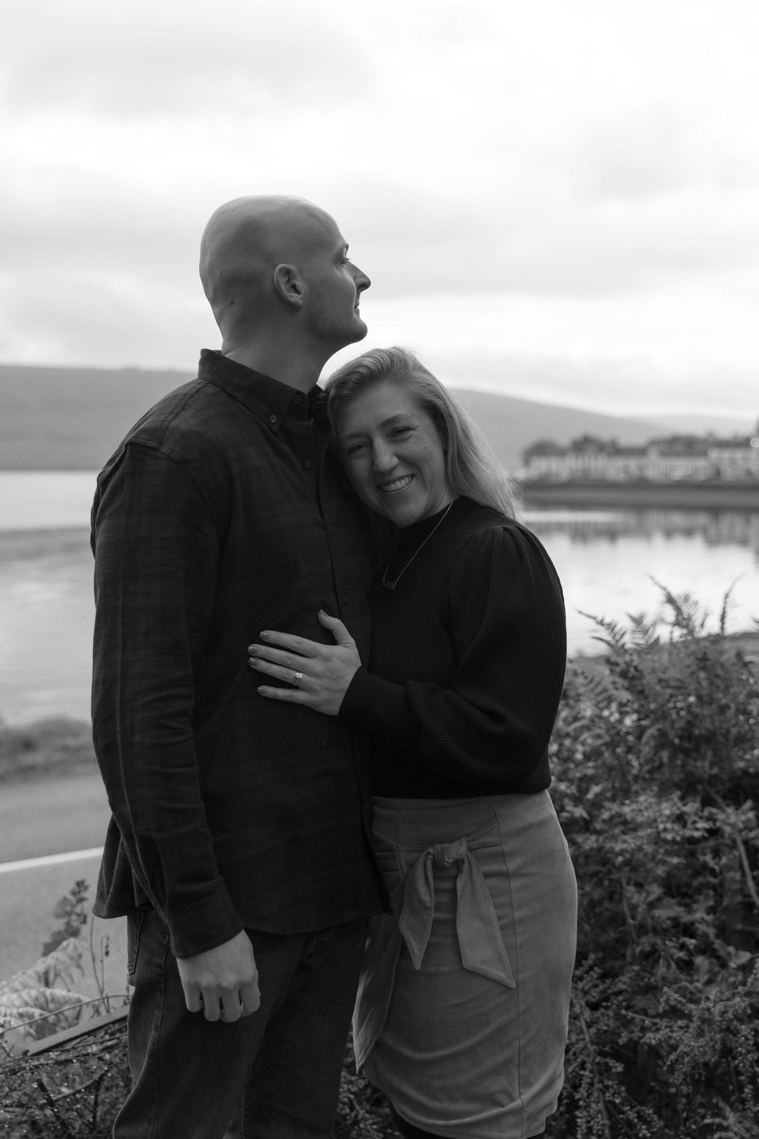Romantic couple posing in front of Inveraray Castle