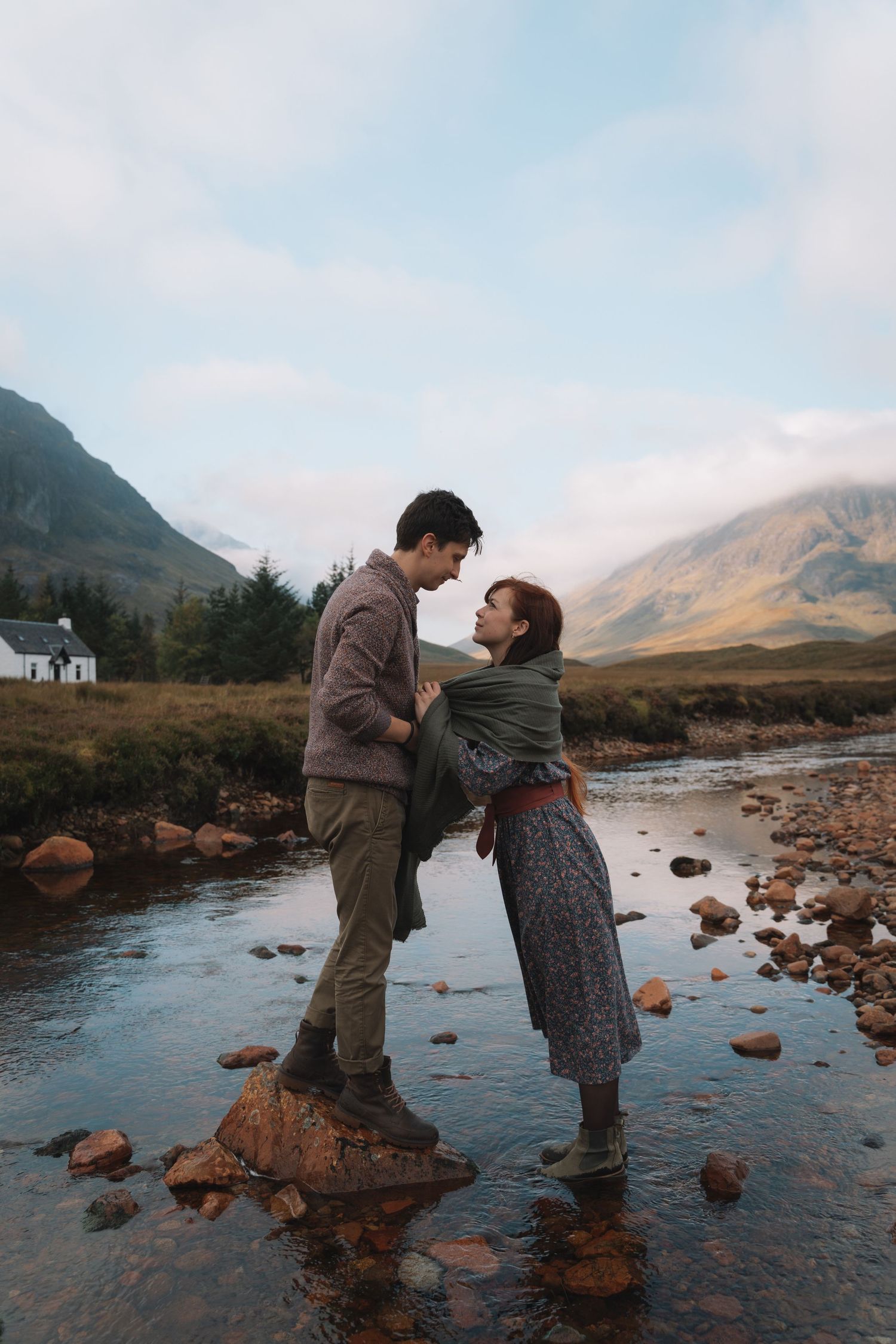 Candid moment in Glencoe mountains during couples shoot