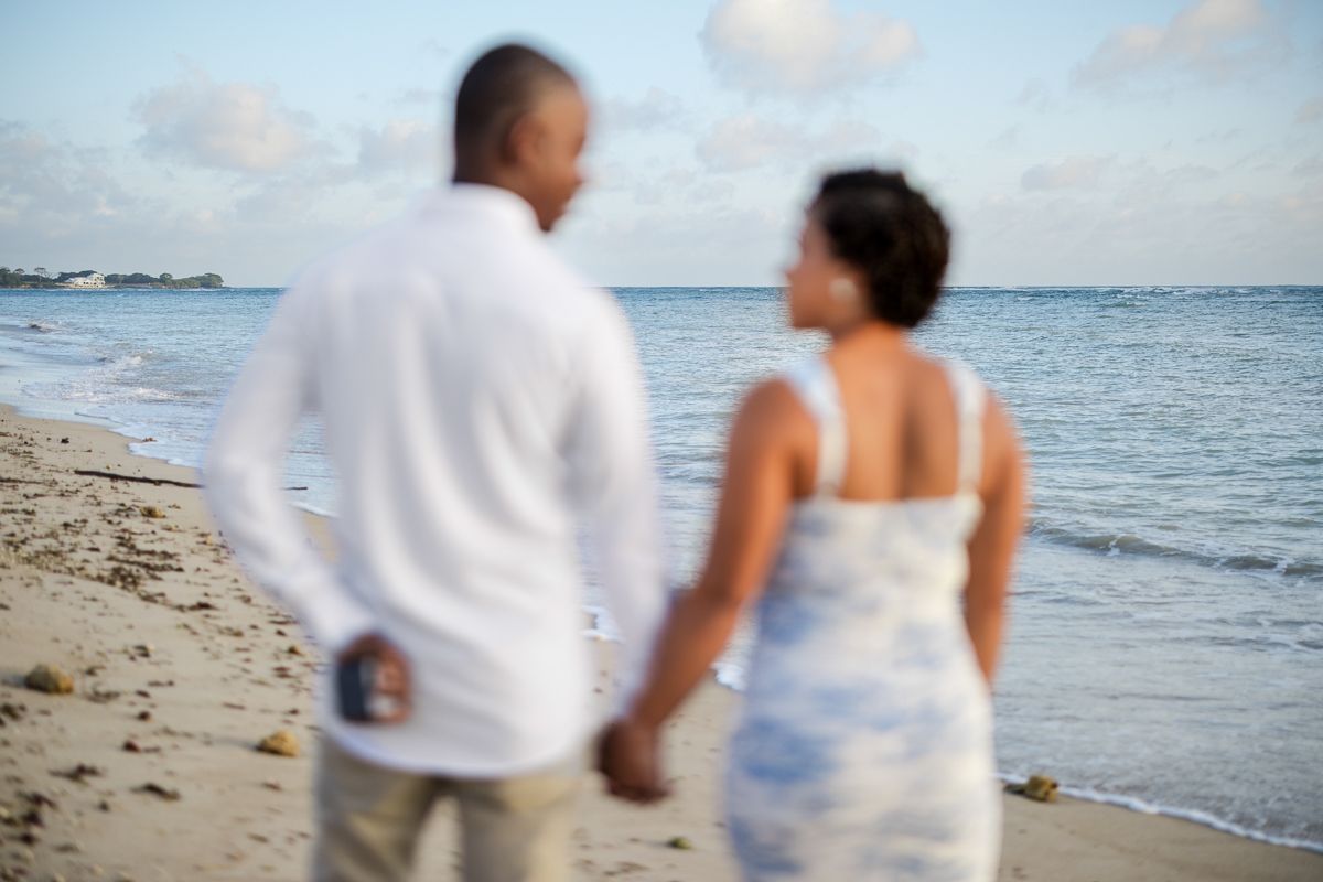 A series of cropped photos showing people walking together on a beach at sunset with ocean waves in the background.