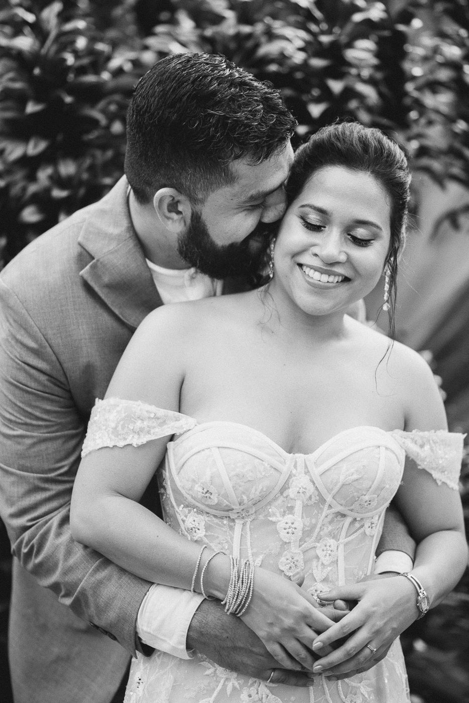 Romantic black and white portrait sequence showing tender moments.