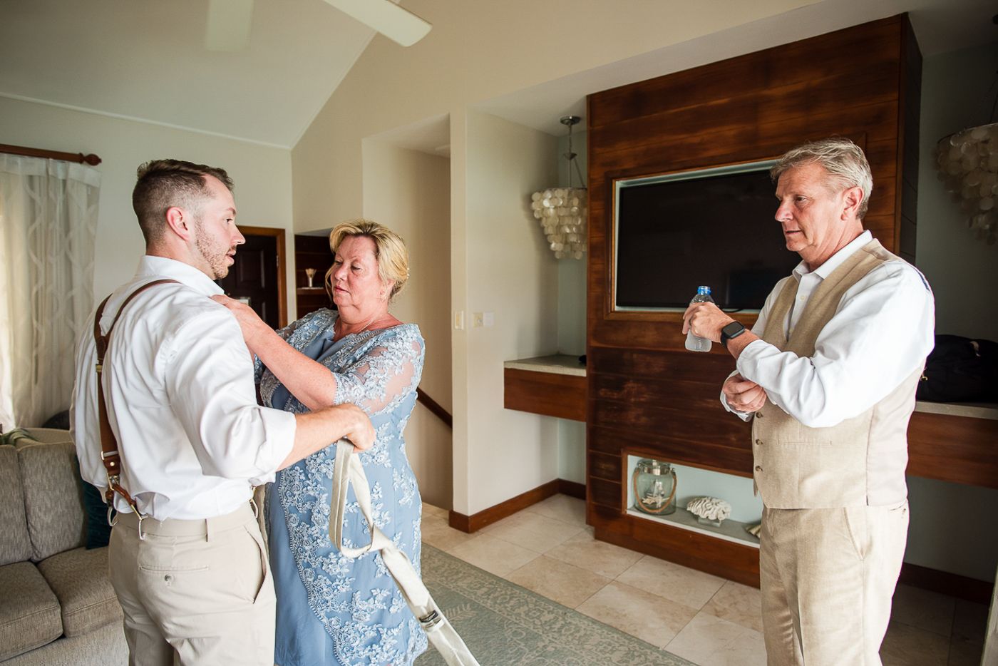 Dance sequence showing playful interaction between two people in a light-filled room.
