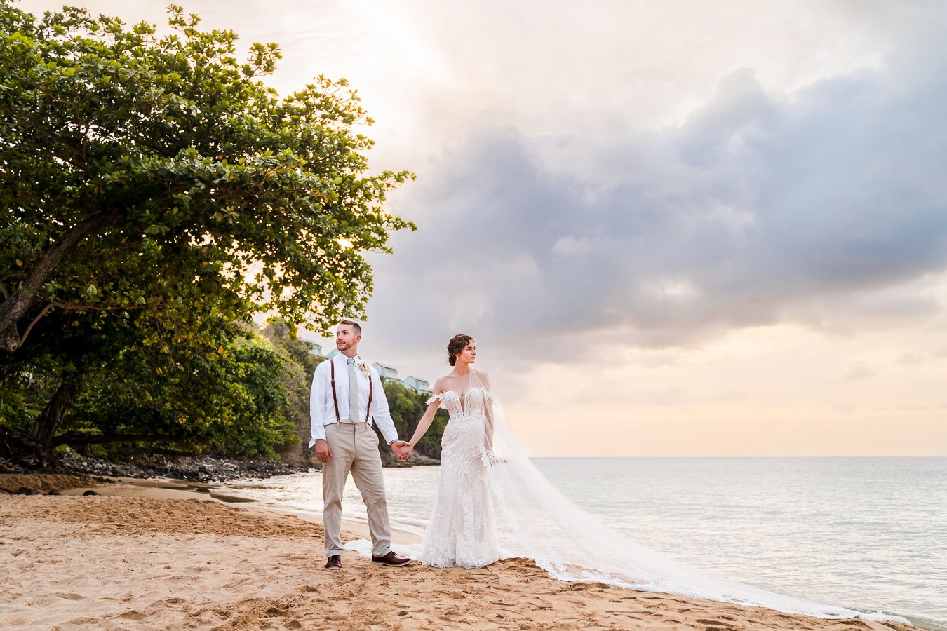 A romantic sunset wedding portrait on beach with  golden sunlight reflecting off the ocean. Sandals Resorts, Celeste and Reece Photography