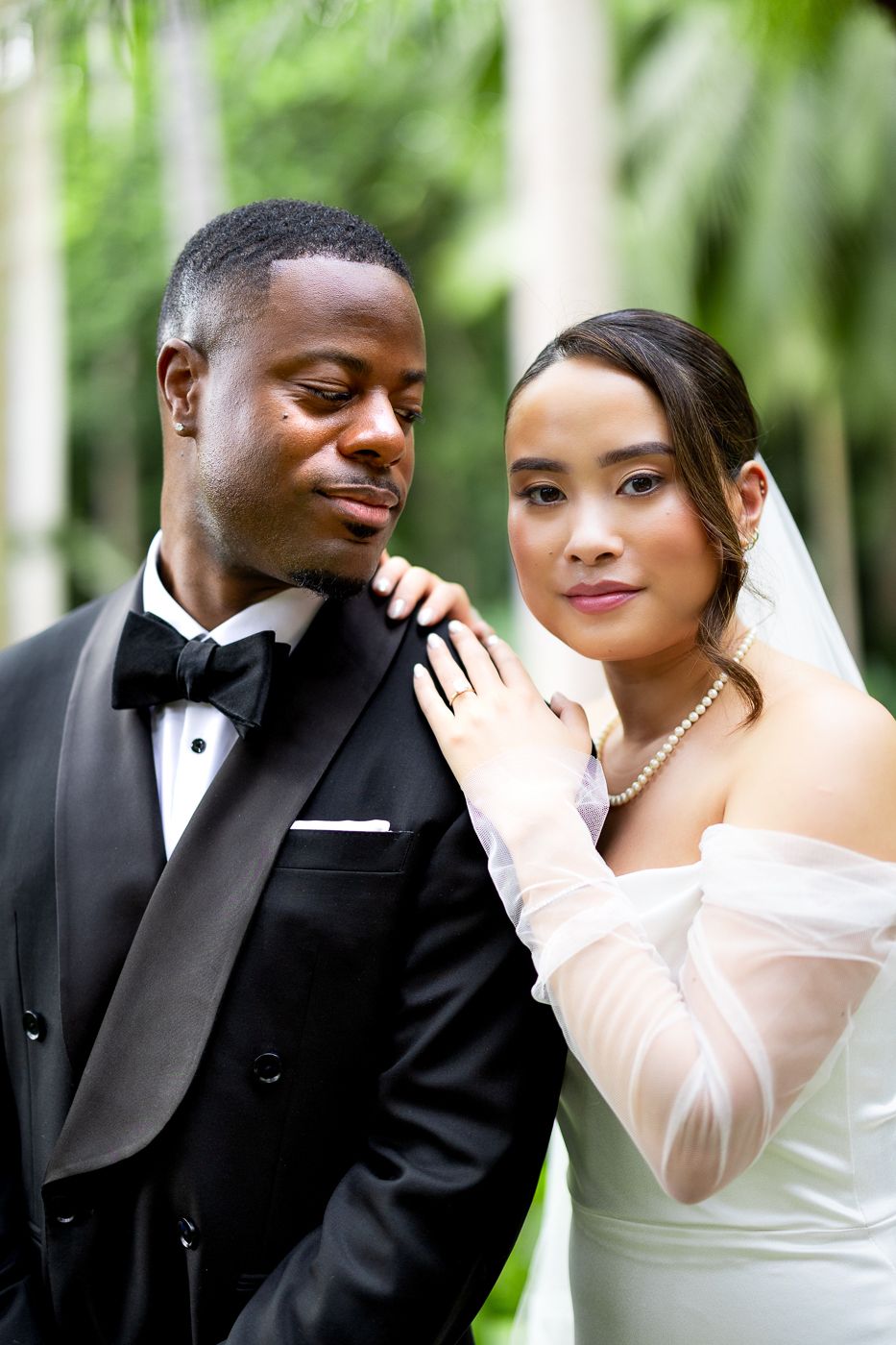 An elegant wedding portrait featuring formal attire and classic posed composition. black luxury wedding photographers Celeste and Reece
