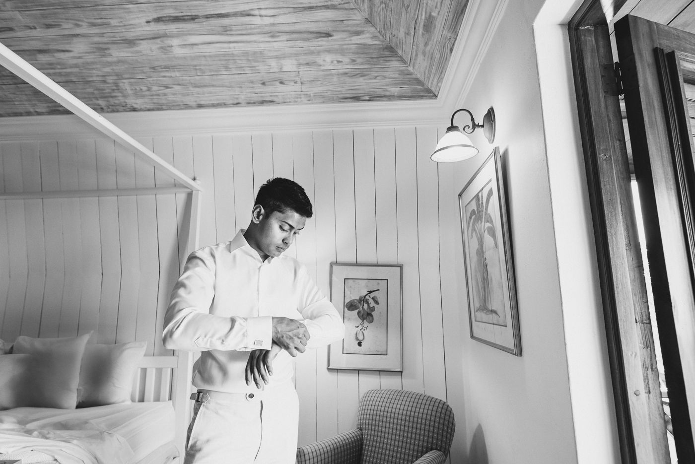 Black and white interior photos showing people in white clothing.