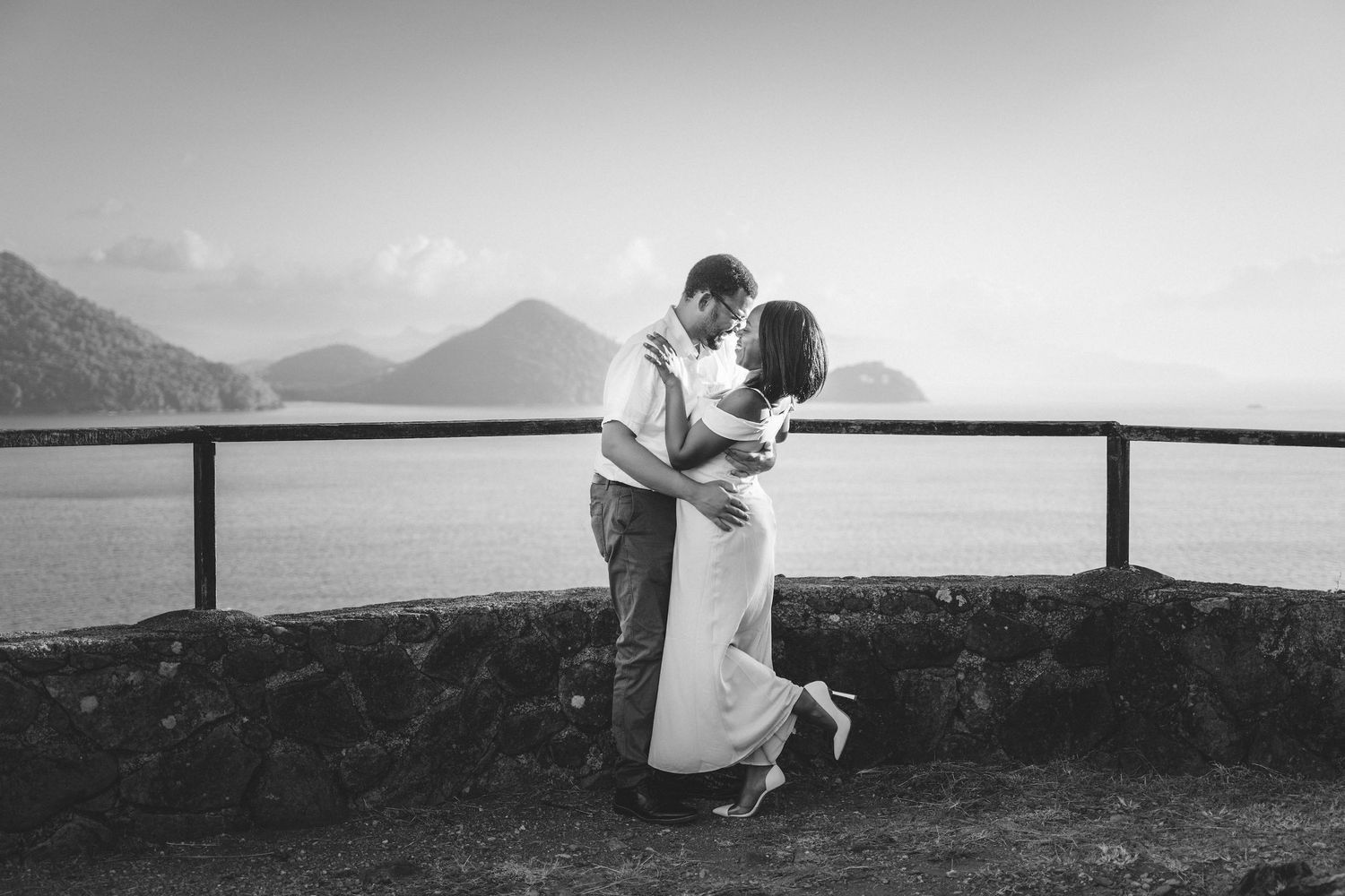 Scenic mountain wedding photos with couple silhouetted against dramatic landscape.