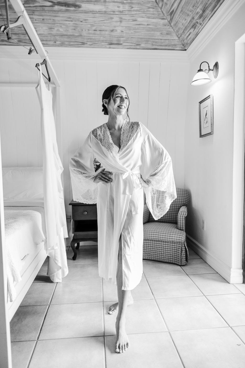 Black and white photos of people in white robes in bright interior room.
