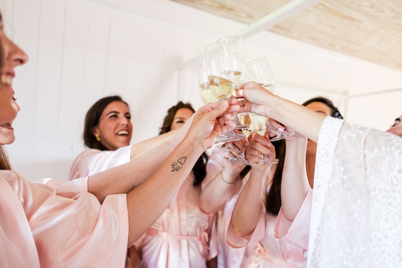 People toasting with champagne glasses in celebration.