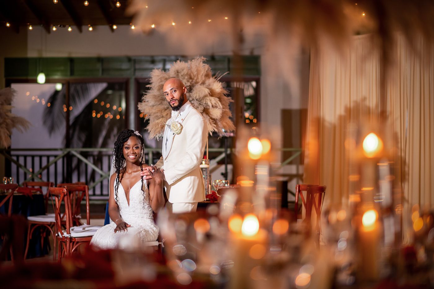 Wedding reception venue with warm ambient lighting and romantic atmosphere.