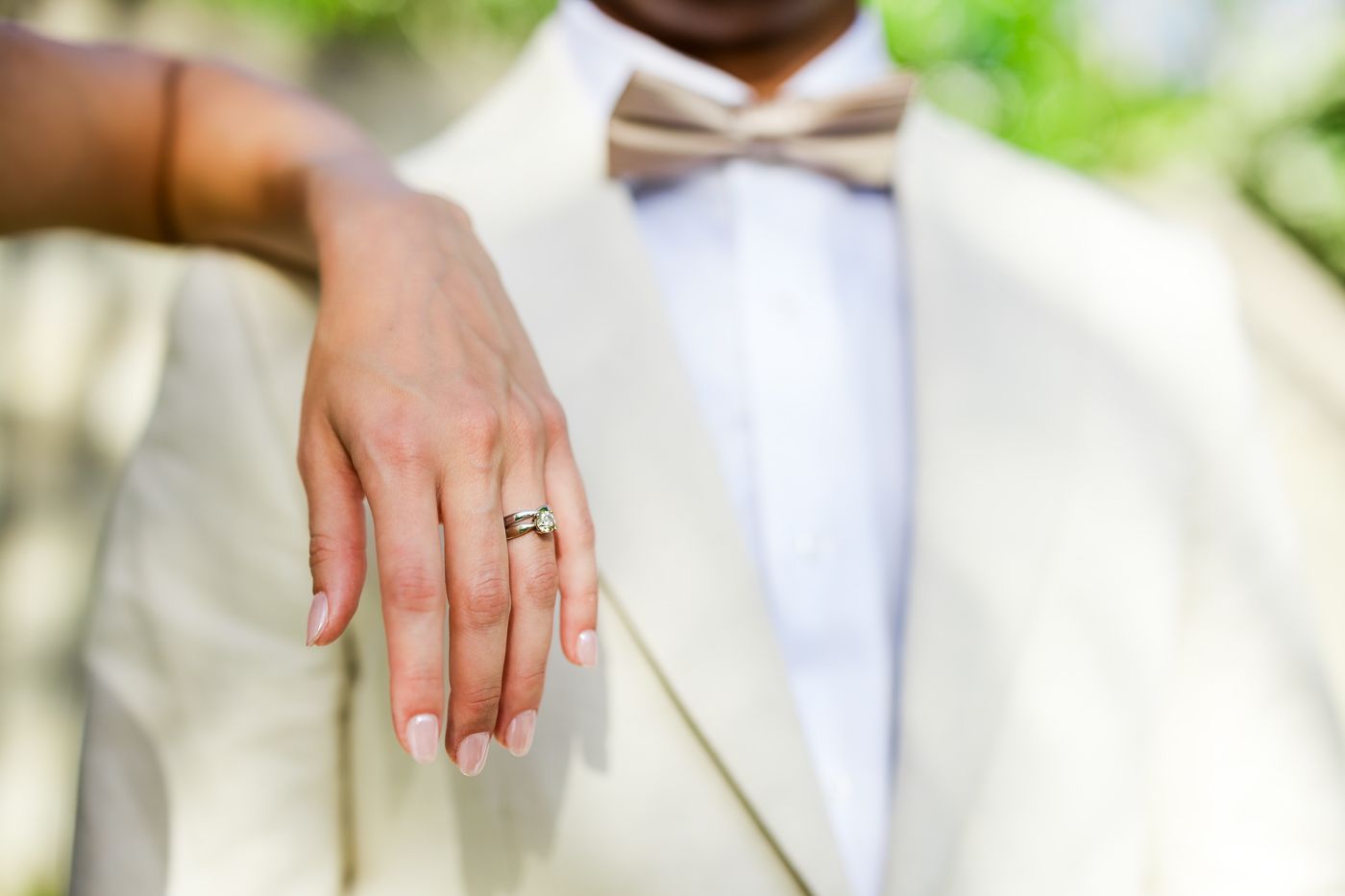 Close-up shots highlighting wedding details and tender moments between the couple.