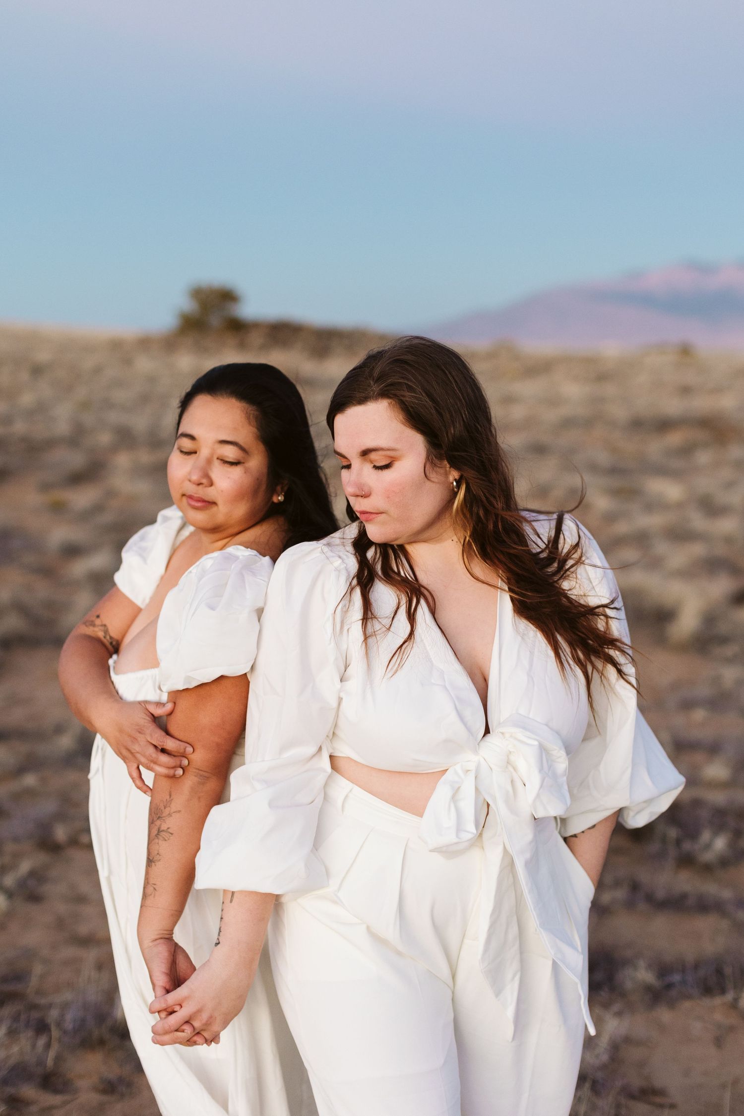 Lesbian couple posing at sunset in Albuquerque, best engagement photographer in Fort Worth, LGBTQ friendly photographer in DFW