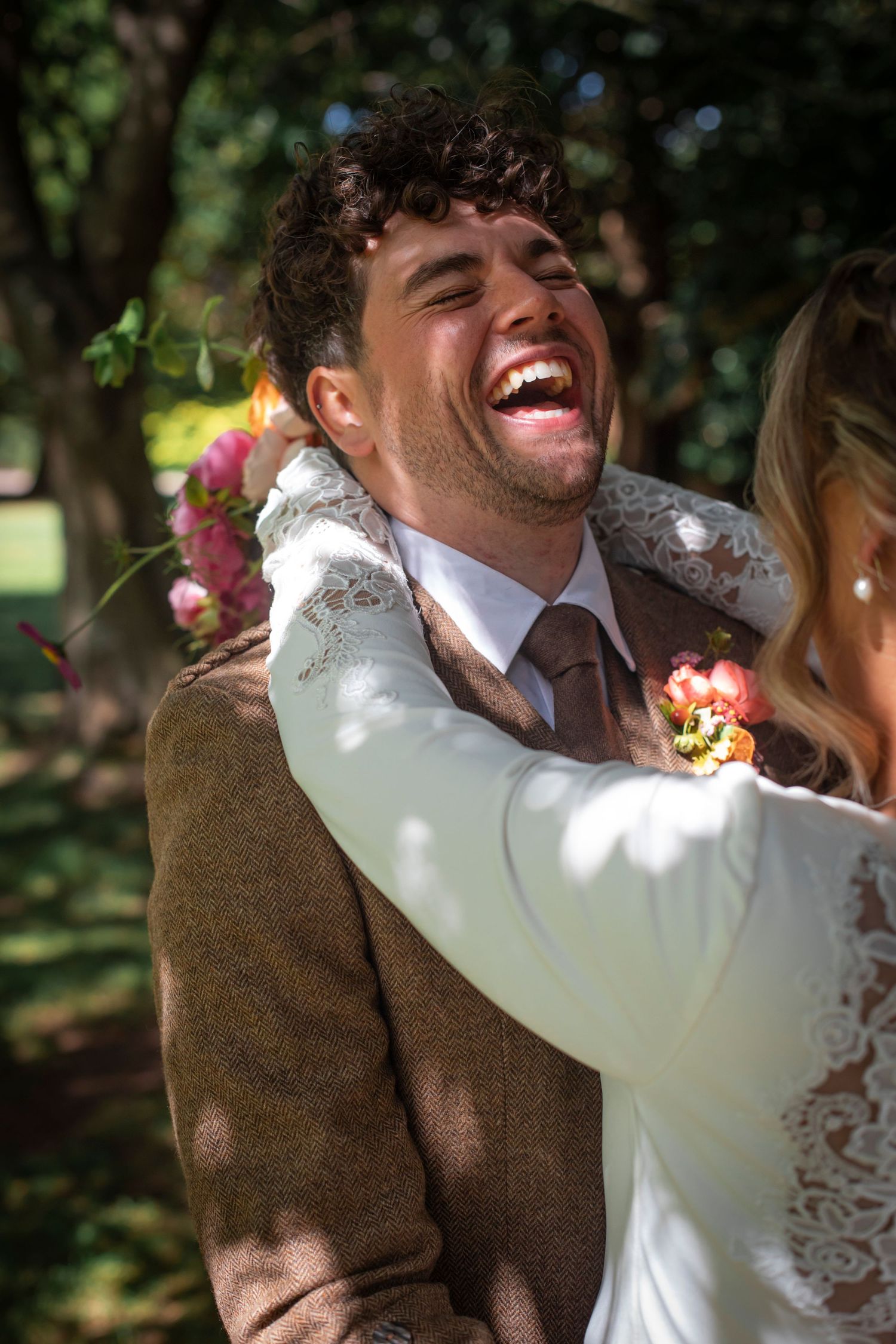 couple laughing together during informal portrait shoot