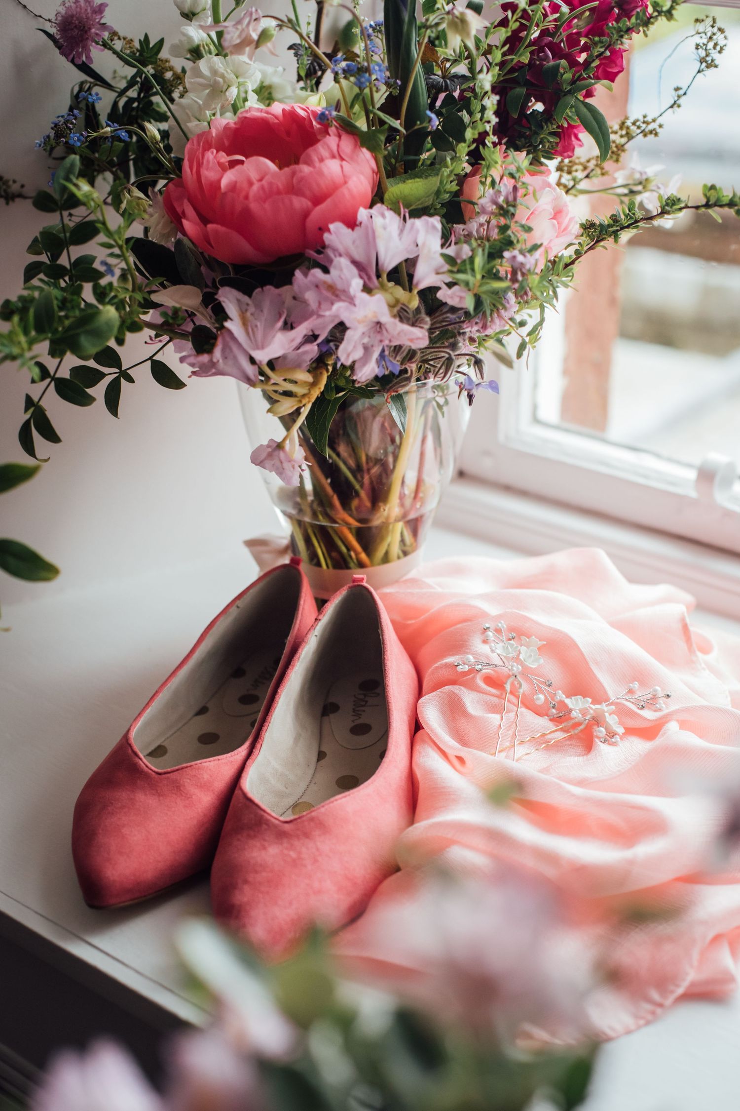 Details of brides flowers and accessories before wedding ceremony