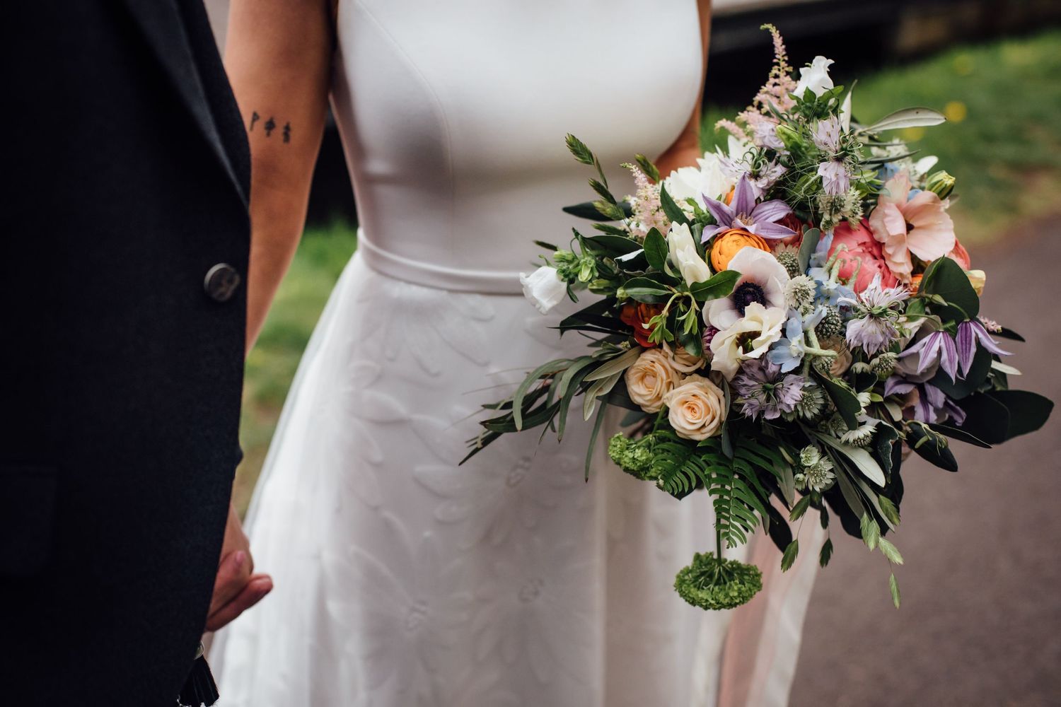 wedding details with dress and flowers