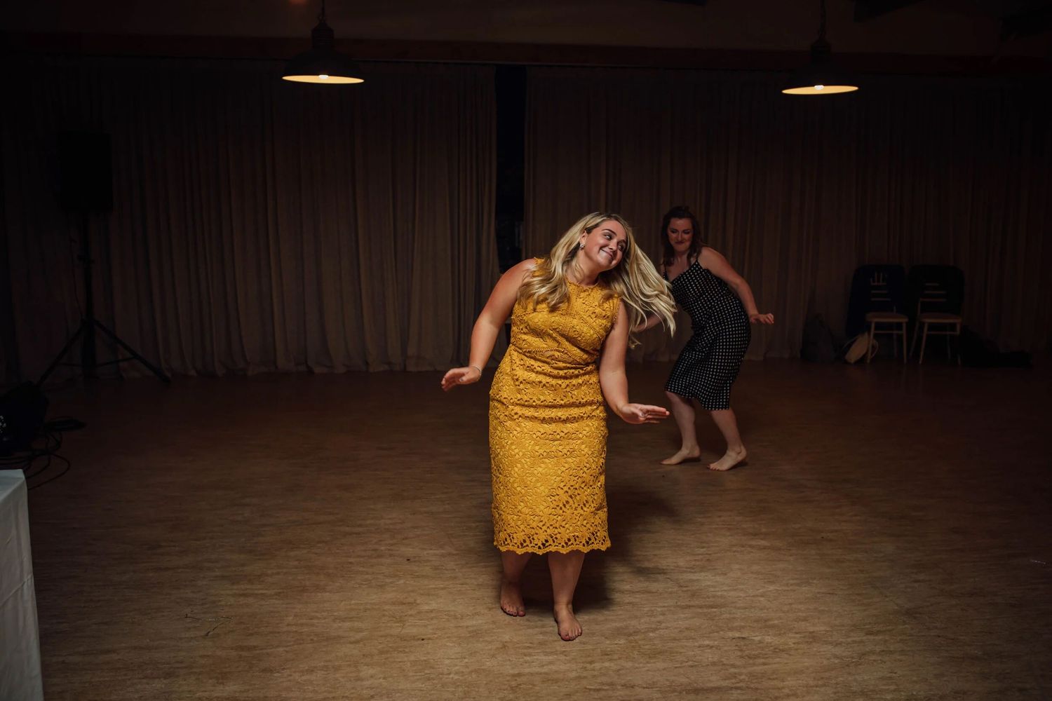 spontaneous wedding guest moment captured on the dance floor