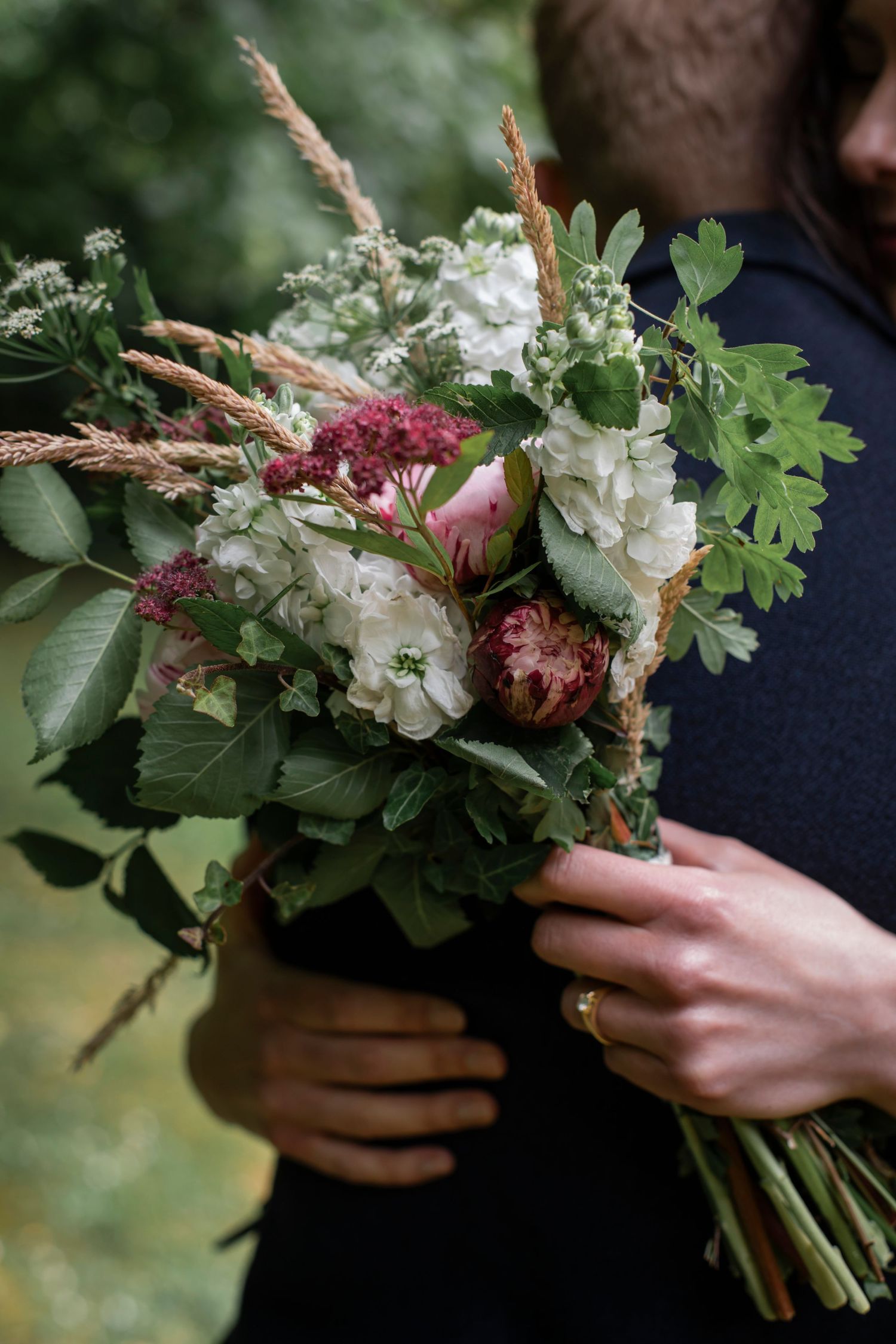 close-up of hands during wedding moment