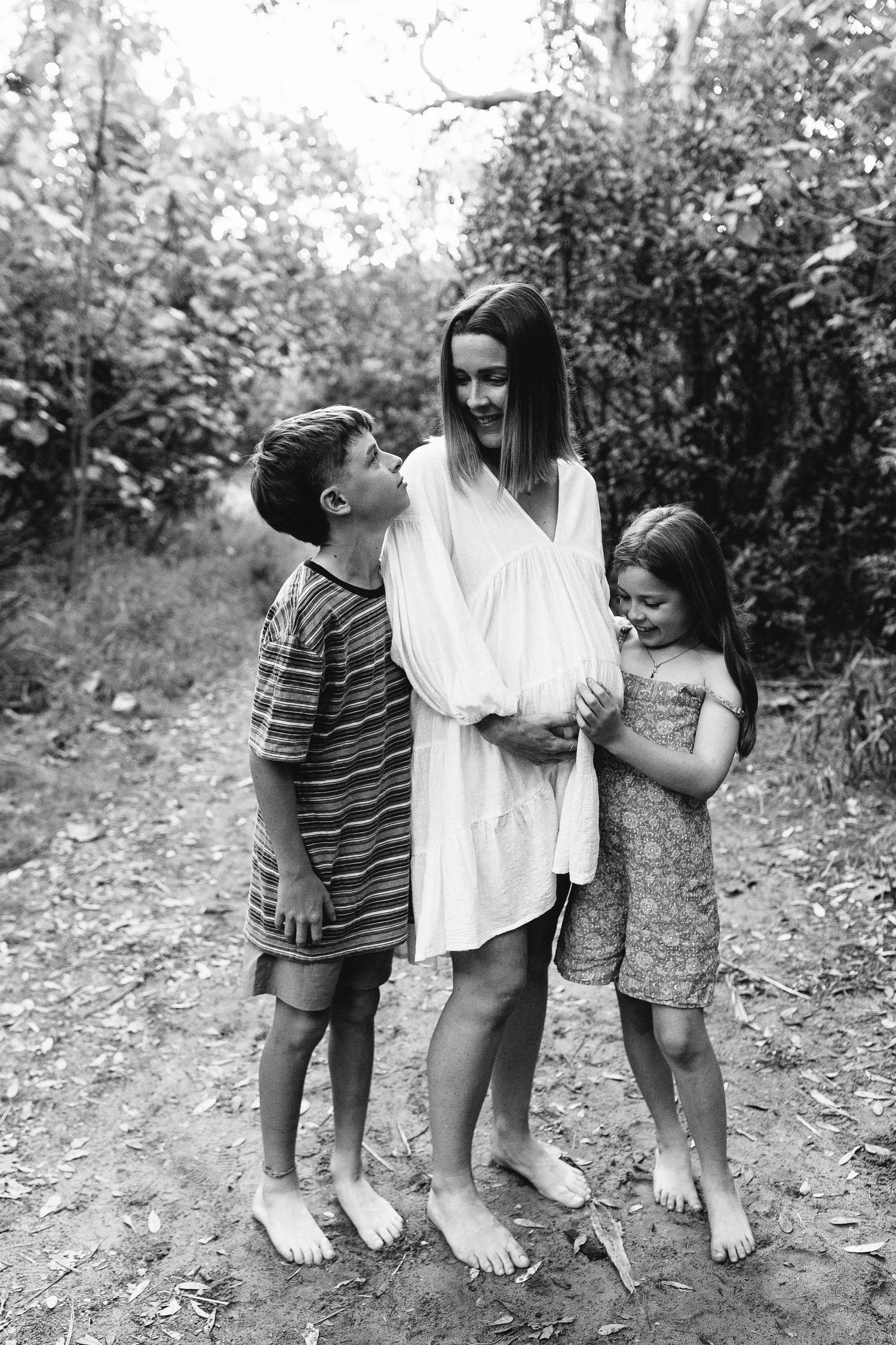 Black and white candid shots of children playing outdoors in casual clothing.