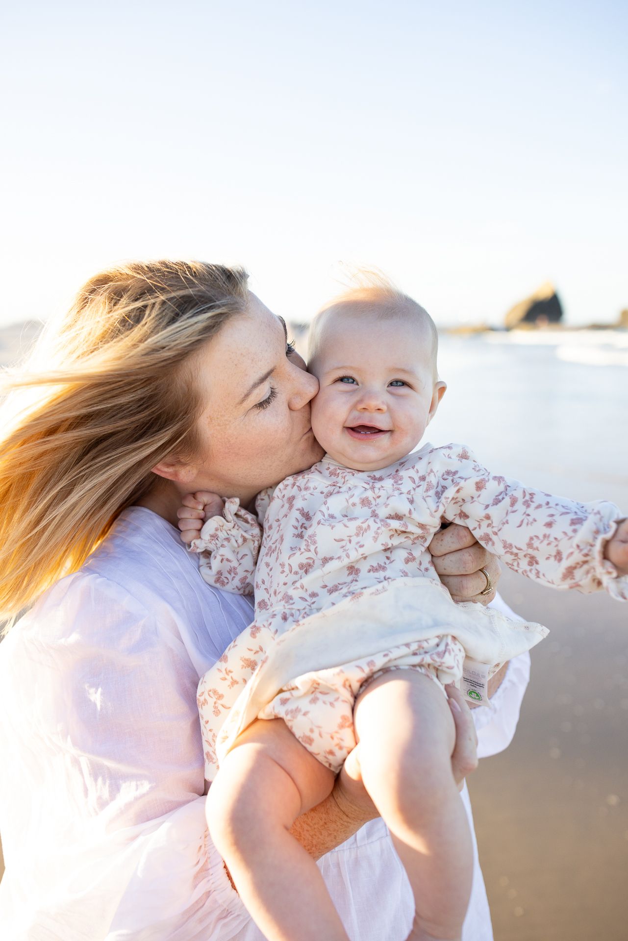 mother and baby at beach