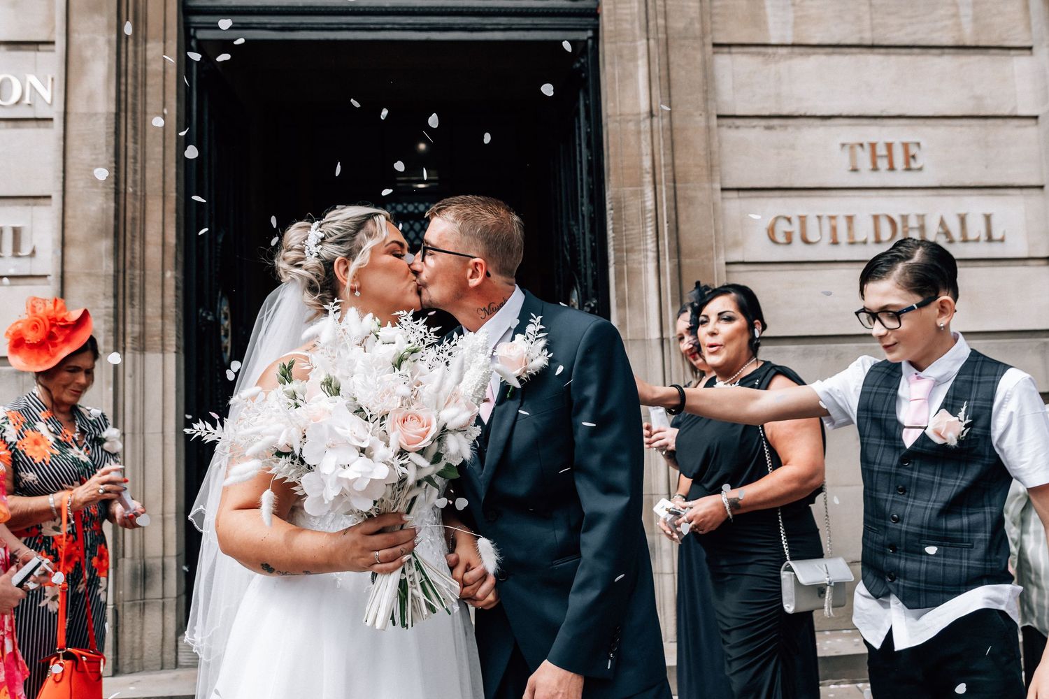 Bride and groom outside Hull Guildhall