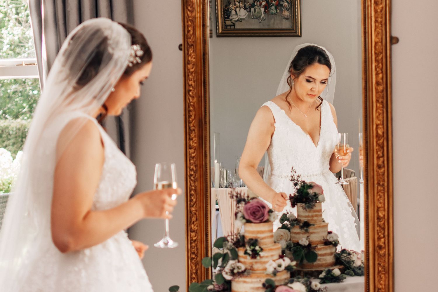 Bride looking at cake at Dunedin Country House