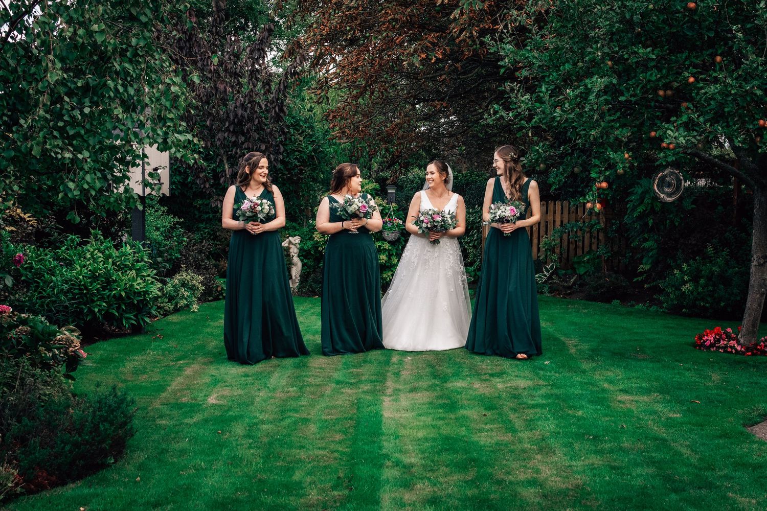 Bride posing in her garden