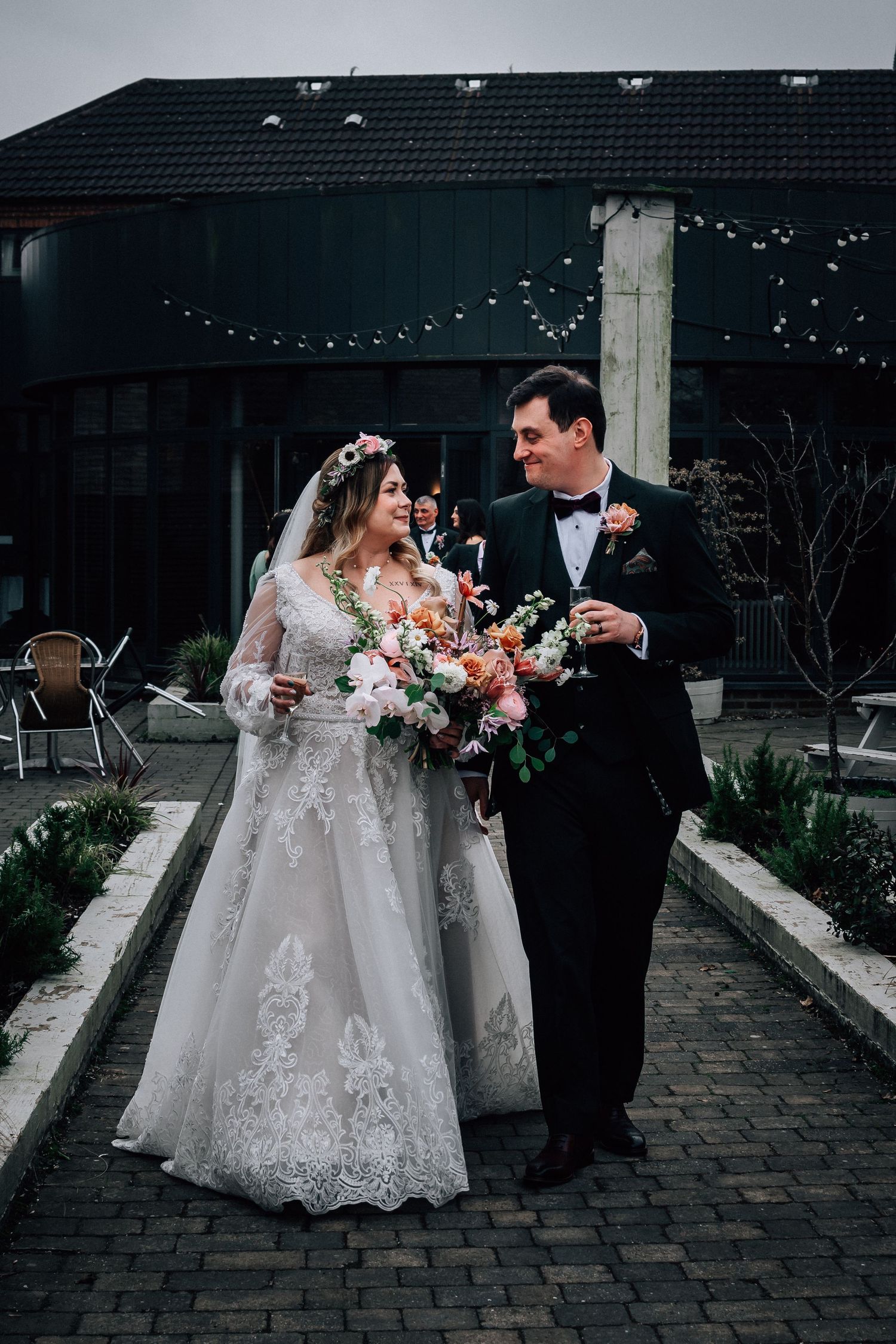 Bride and groom walking at Lazaat Hotel Hull