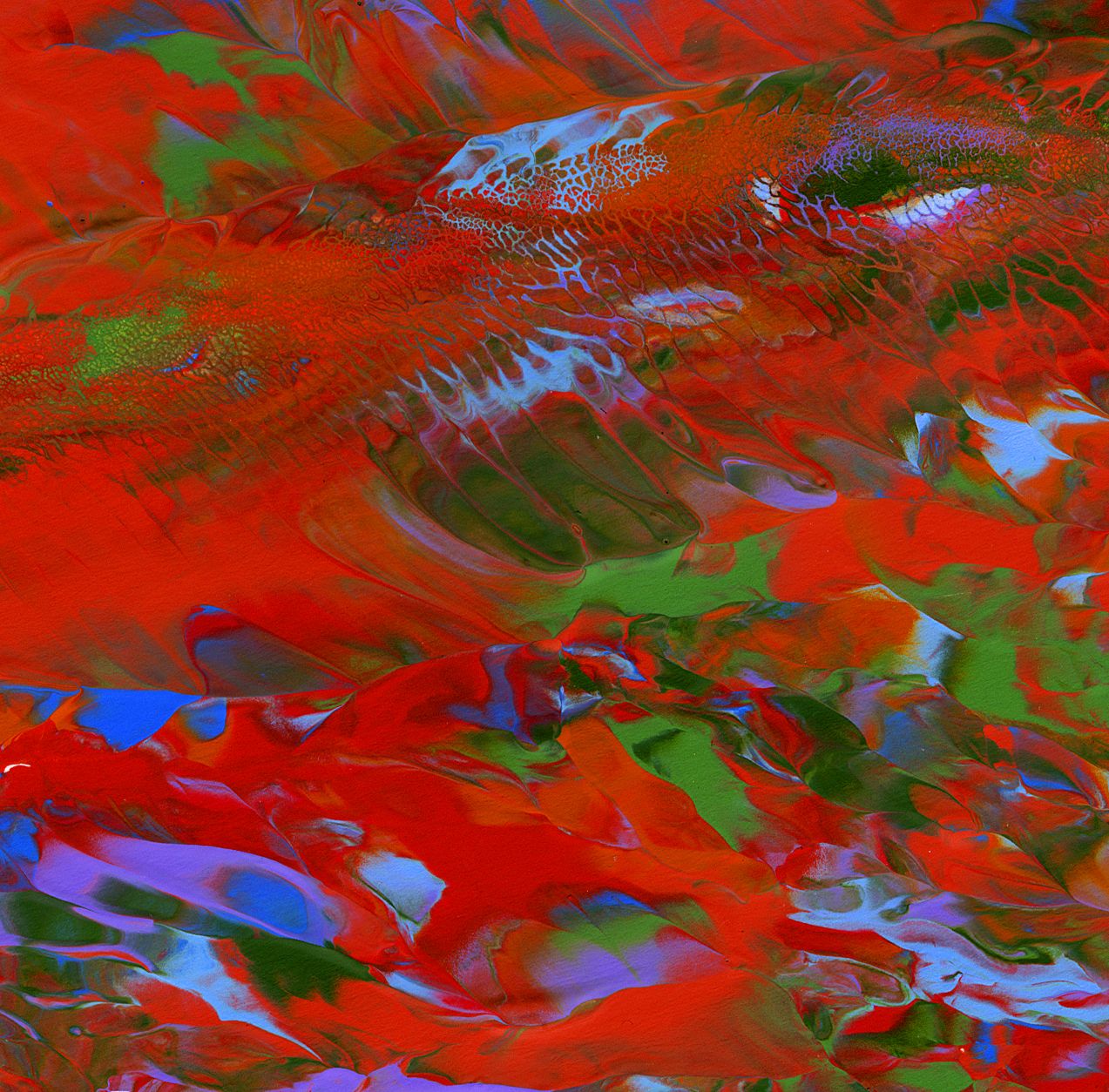 Abstract digital art with swirling red, green, and blue paint-like patterns creating a vibrant, dynamic composition.
