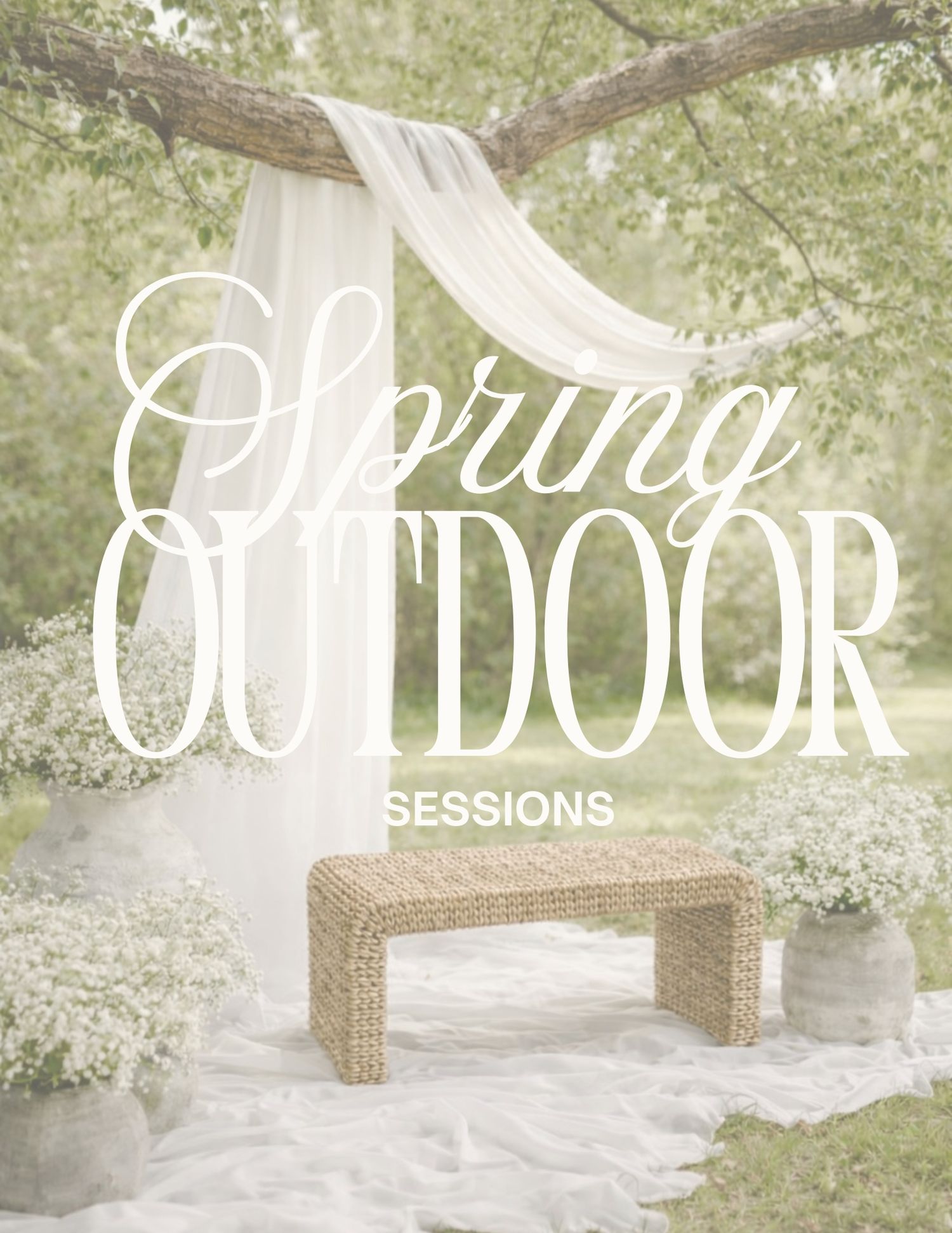 Outdoor photography setup with white fabric and woven bench among spring blossoms.