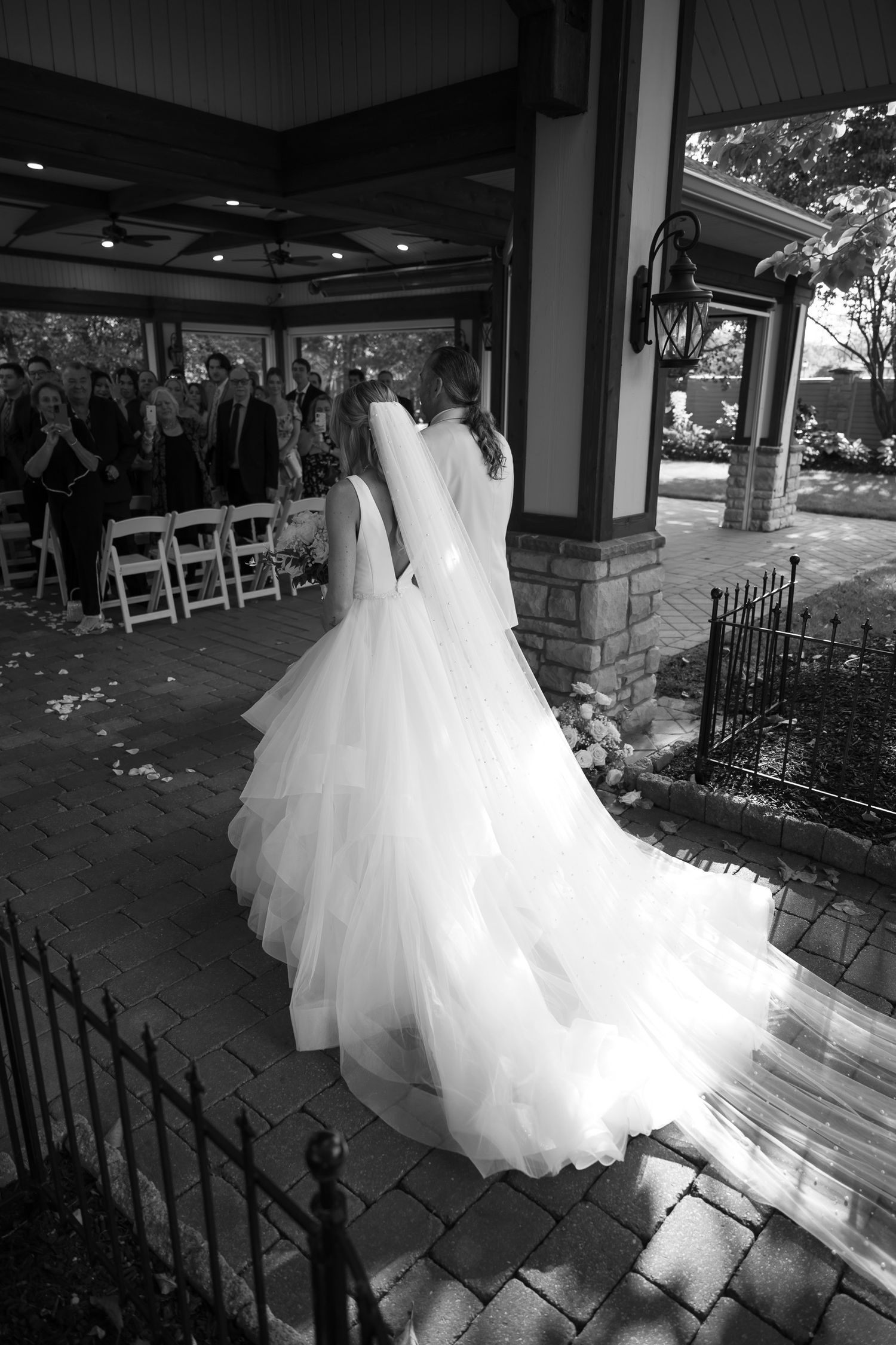 A wedding dress with a voluminous tulle skirt is photographed by a South Jersey wedding photographer.