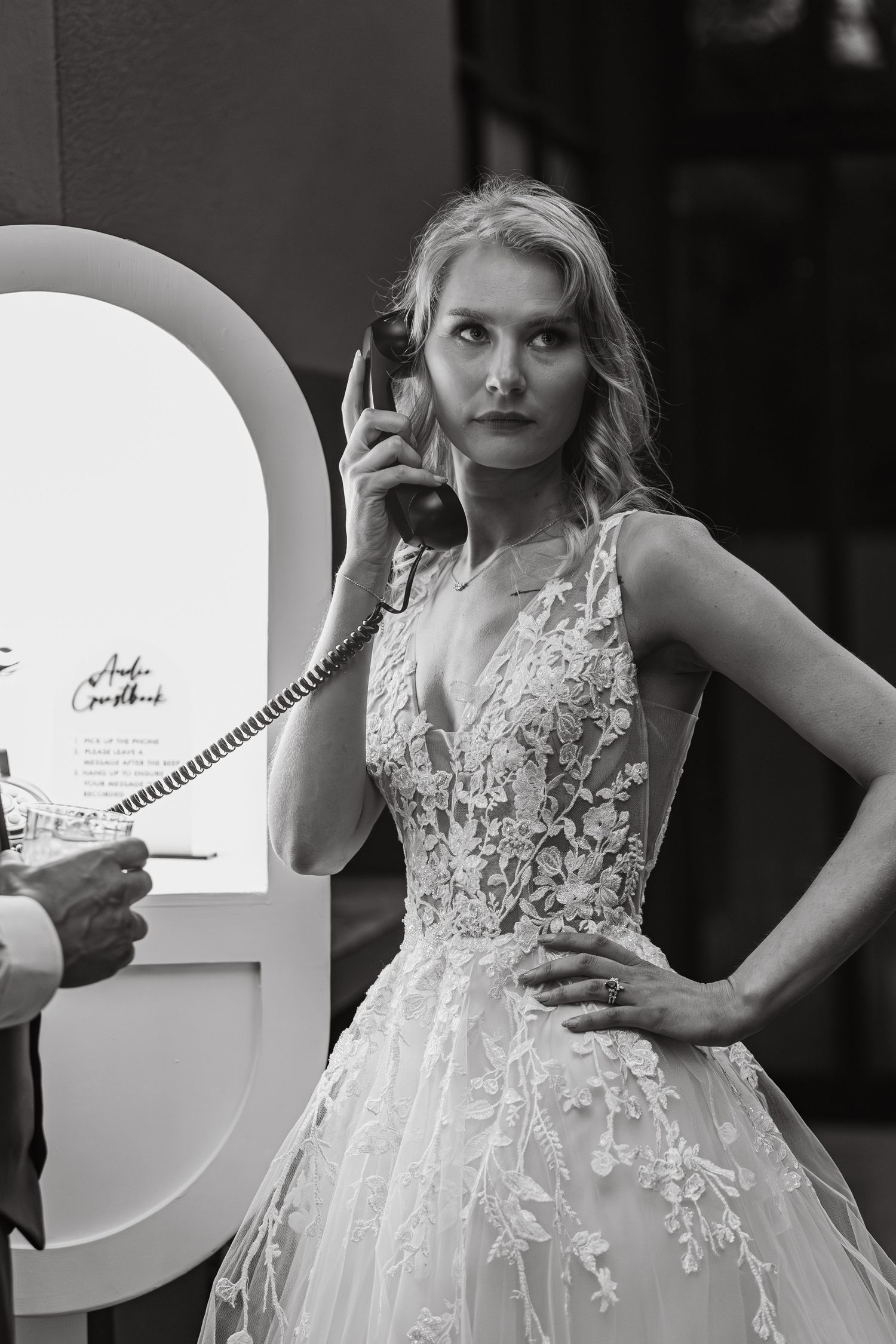 Close-up details of an elegant lace wedding dress with delicate floral appliques.