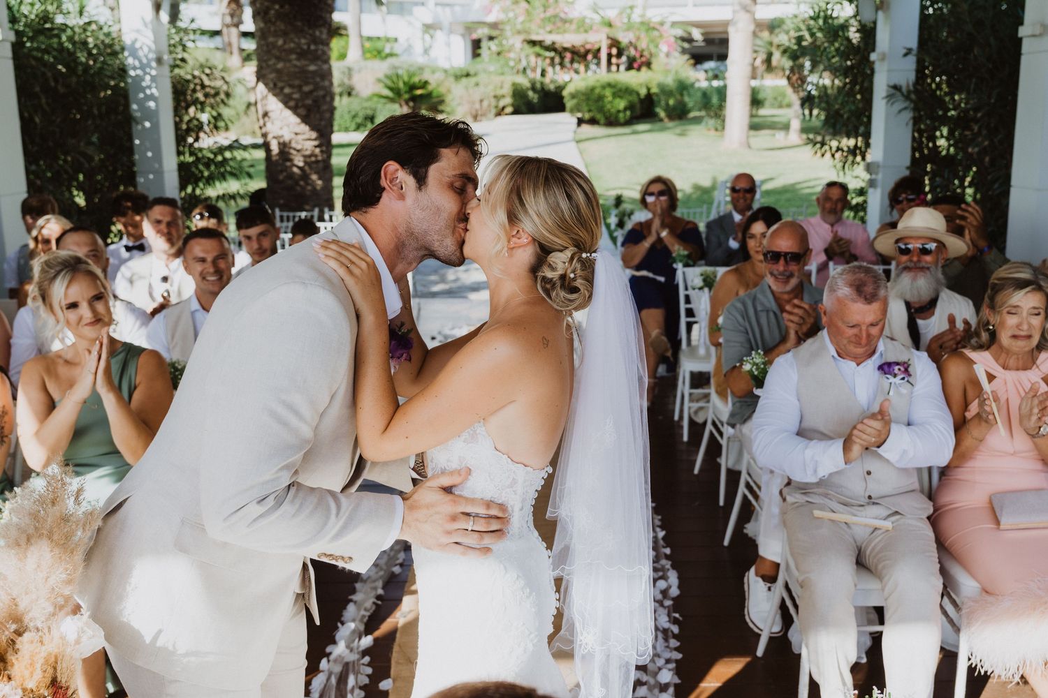 Series of candid wedding photos capturing the joy and excitement during an outdoor reception.