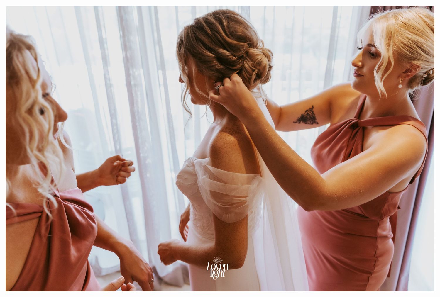 Wedding preparation scene with flowing curtains and soft lighting.