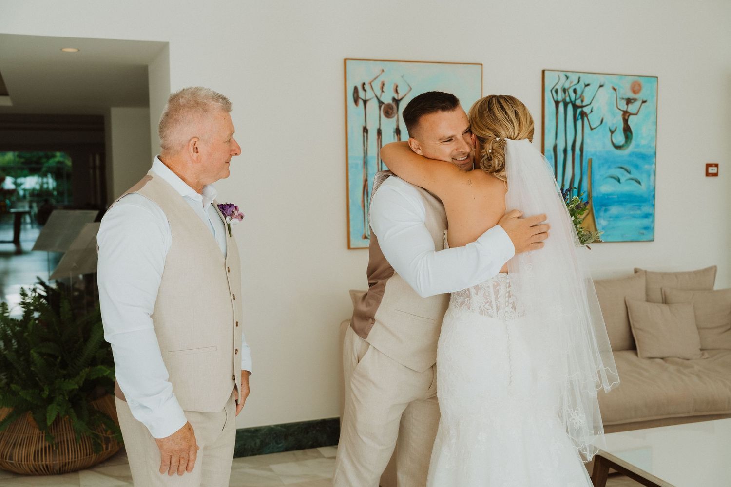 Candid wedding day moments captured in sequence with turquoise artwork in background.