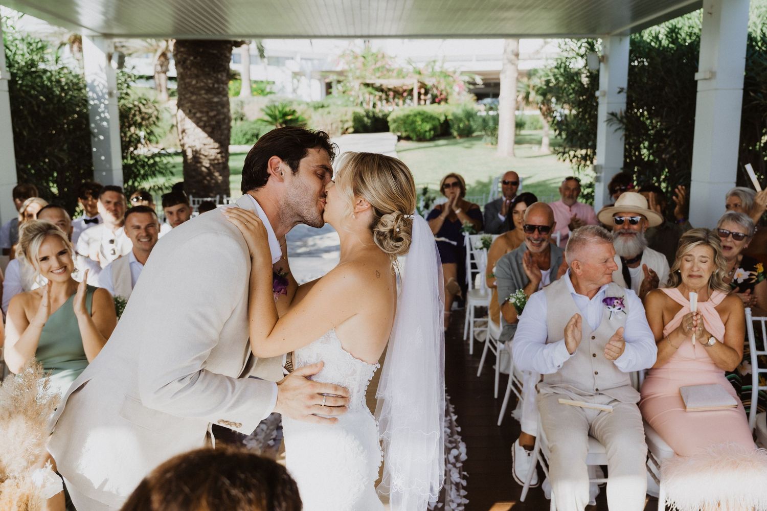Wedding celebration sequence showing emotional moments between the couple and their guests.
