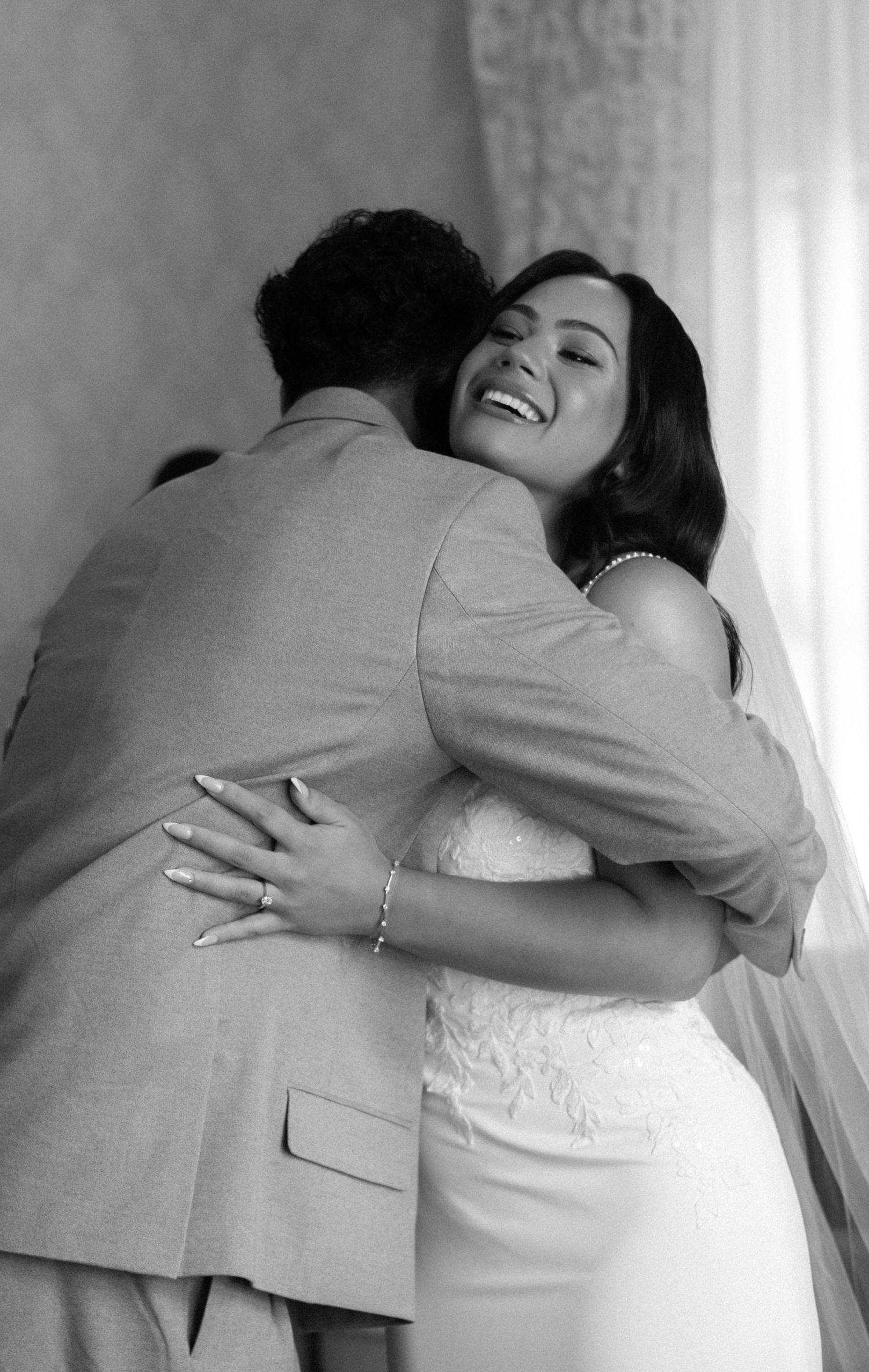 Bride having an emotional moment with her brother